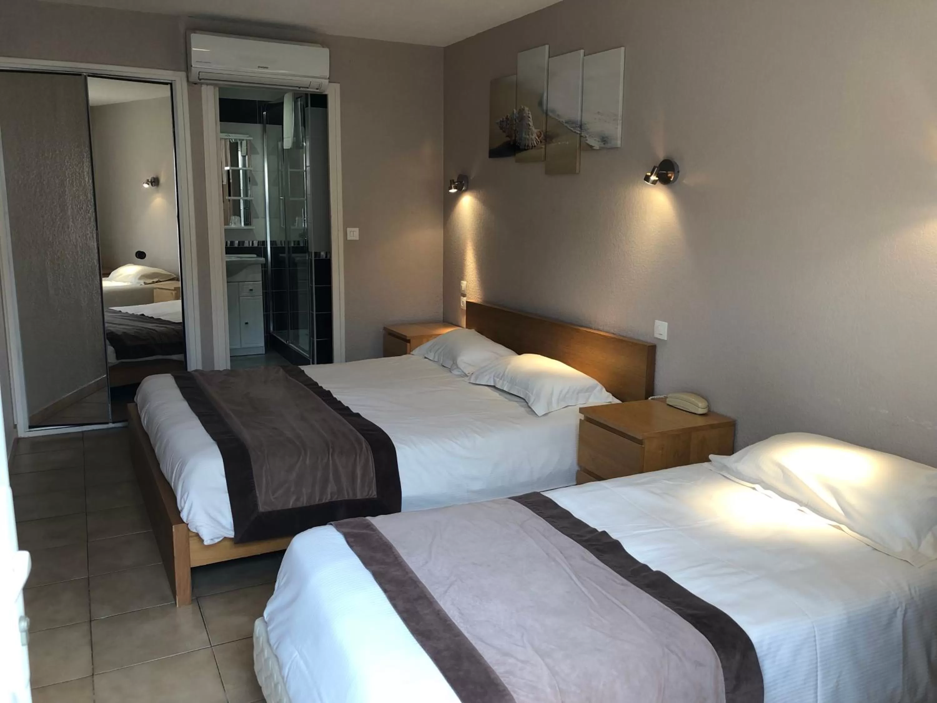 Bed in Logis Hotel Restaurant le Mirador