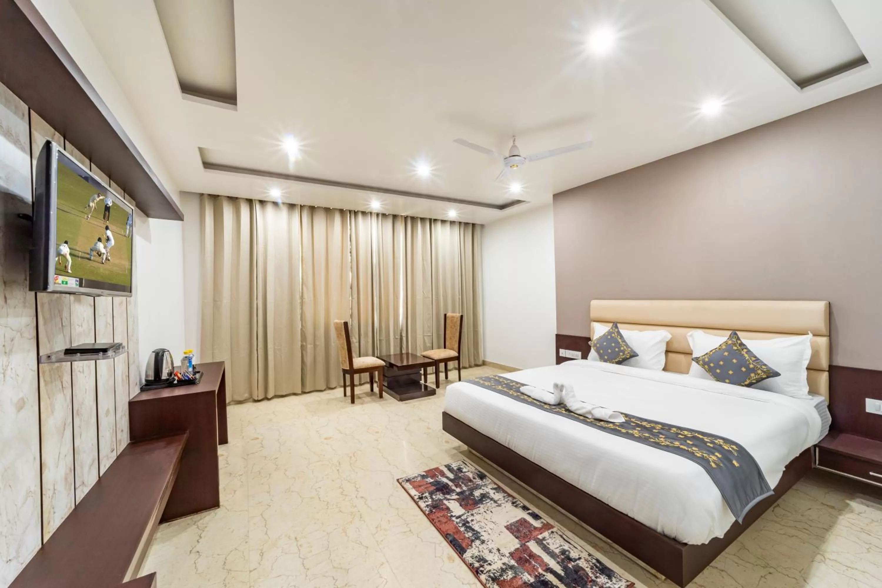 Photo of the whole room, Bed in Hotel Trimurti