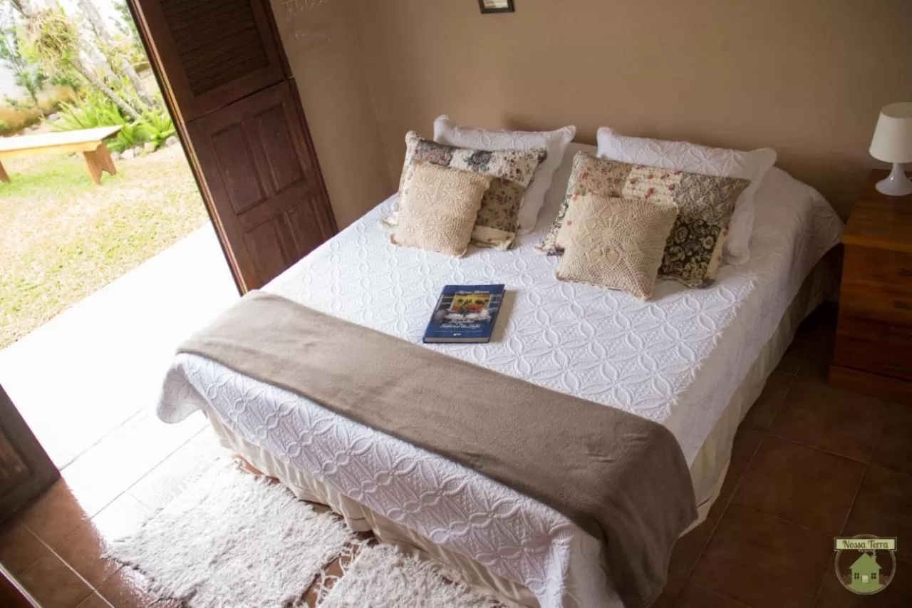 Bed in Pousada Nossa Terra