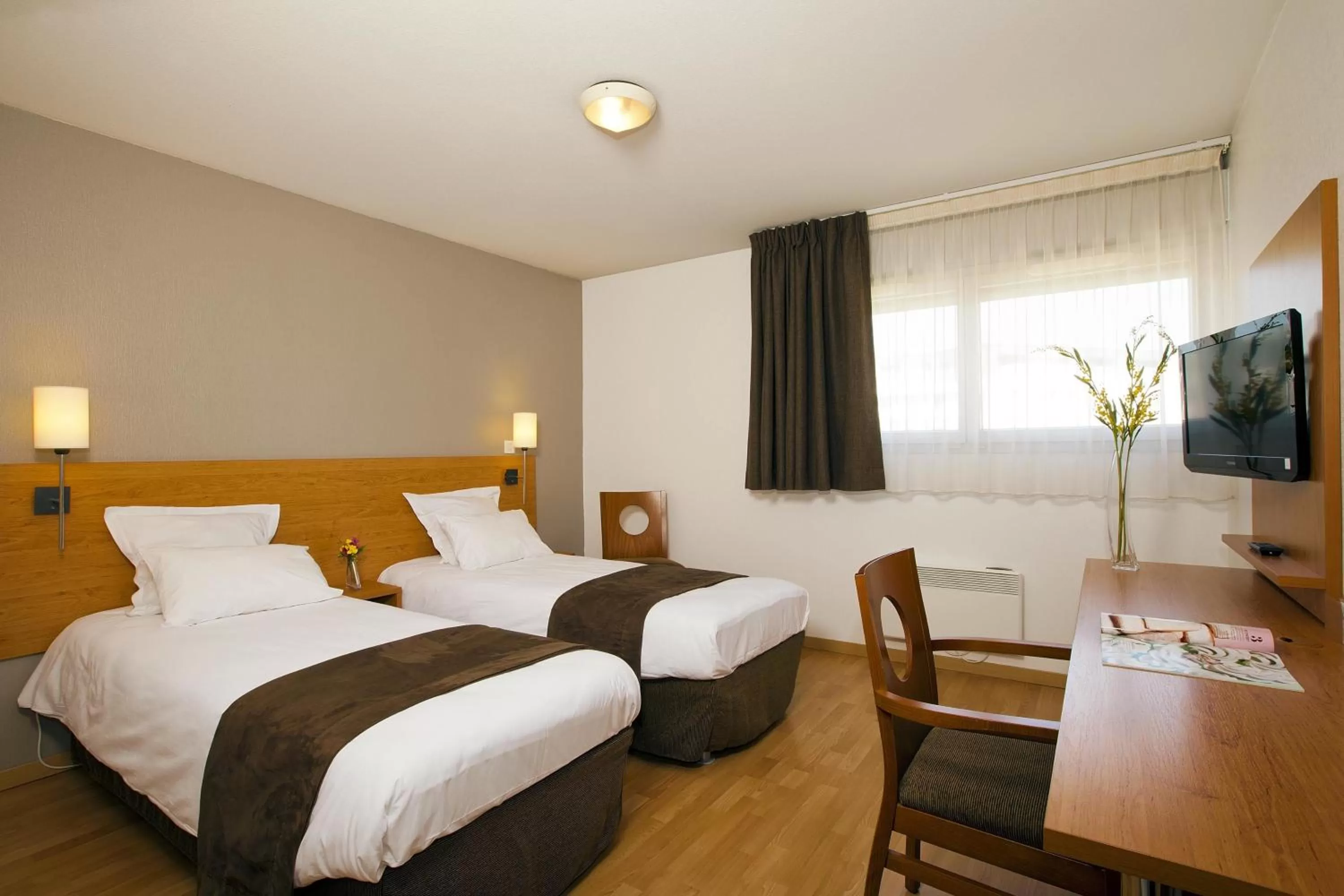 Photo of the whole room, Bed in Séjours & Affaires Nantes Ducs De Bretagne