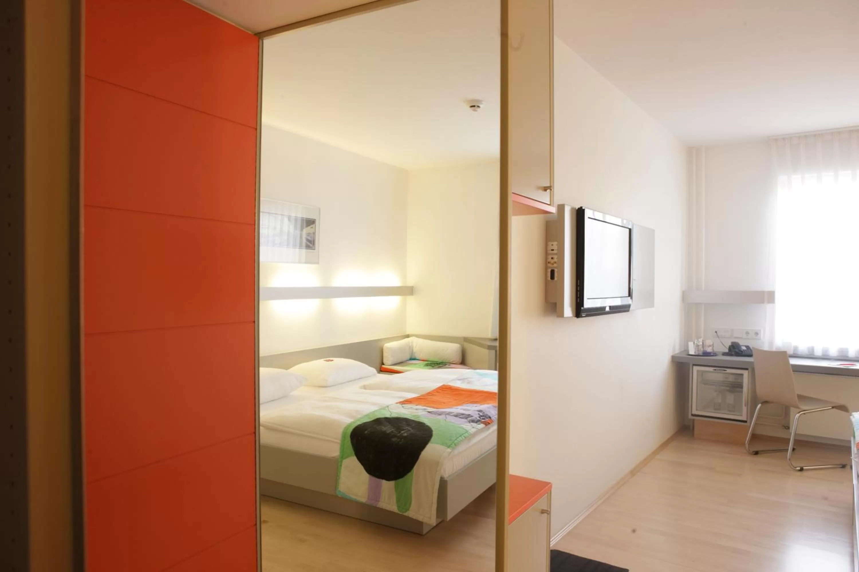 Bed in Hotel Berliner Hof by Coffee Fellows Hotels