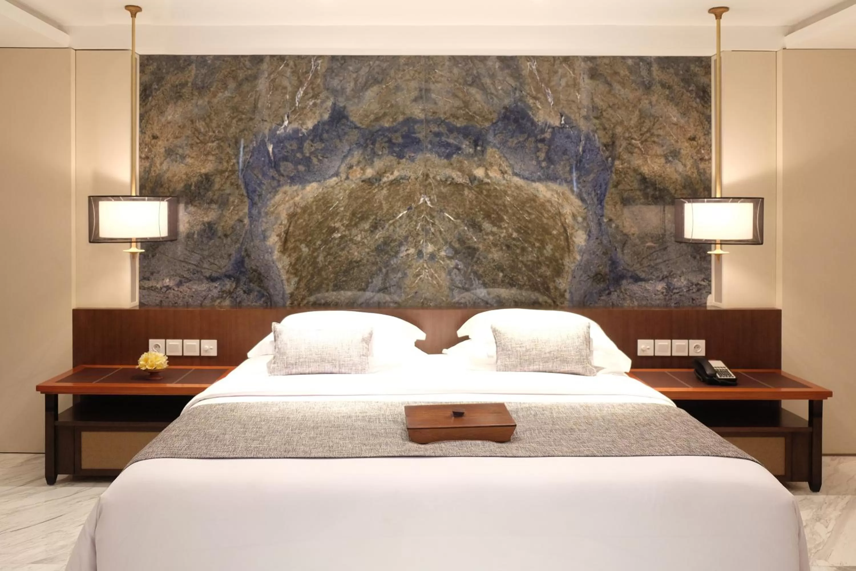 Bed in The Bandha Hotel & Suites