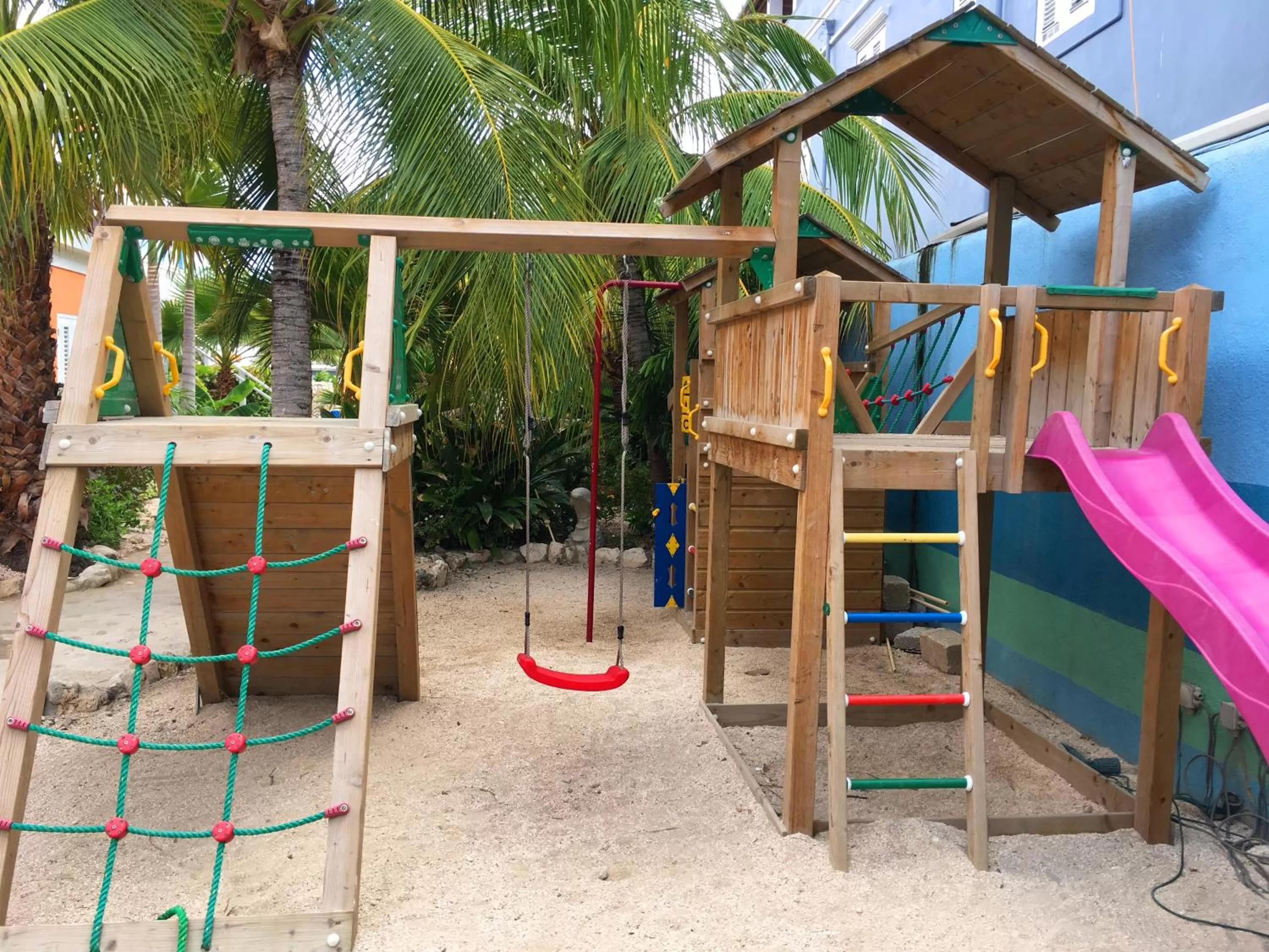 Children play ground in Scuba Lodge & Suites