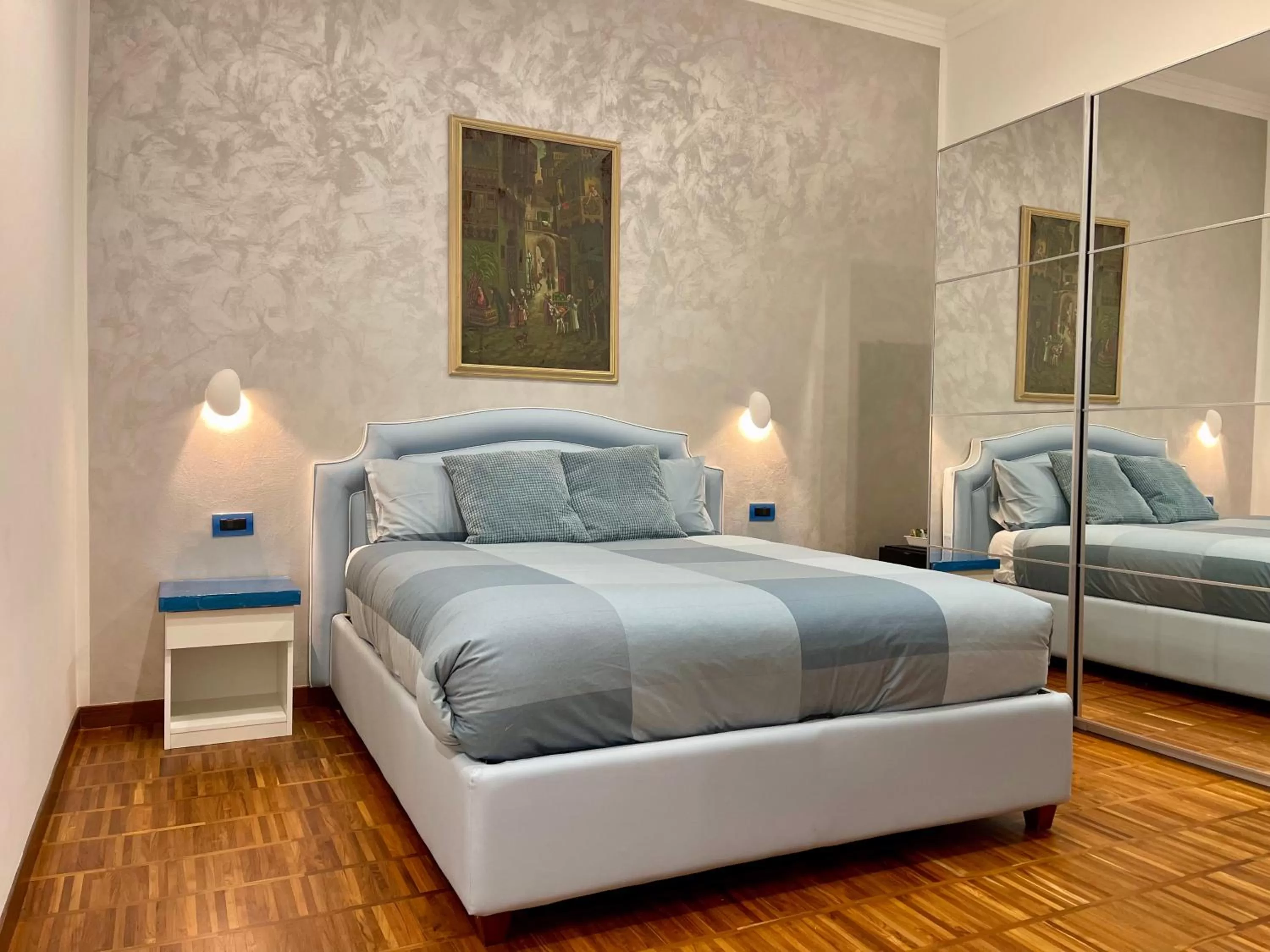 Bed in Tribus Boutique Hotel