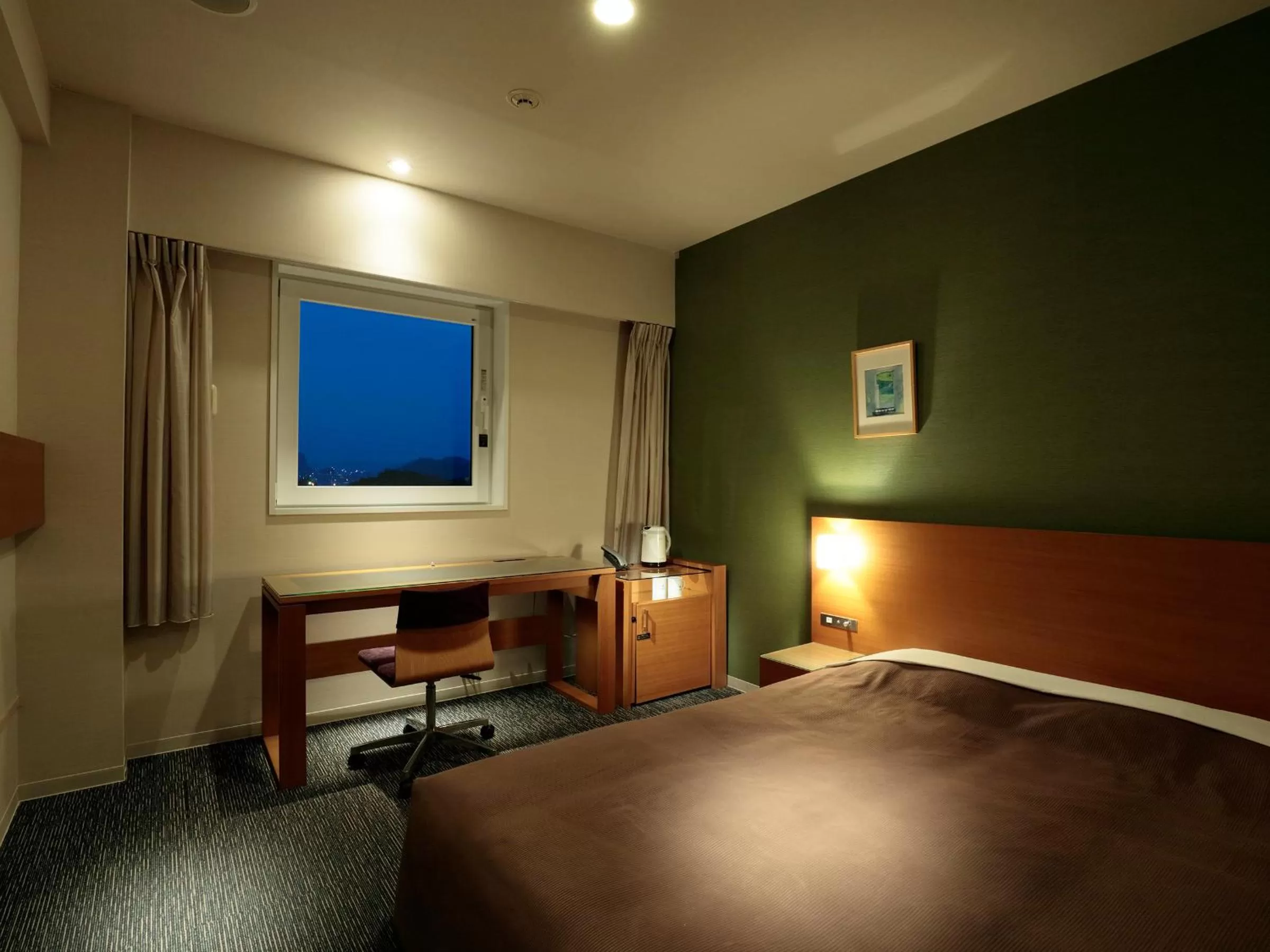 Photo of the whole room, Bed in Candeo Hotels Kameyama