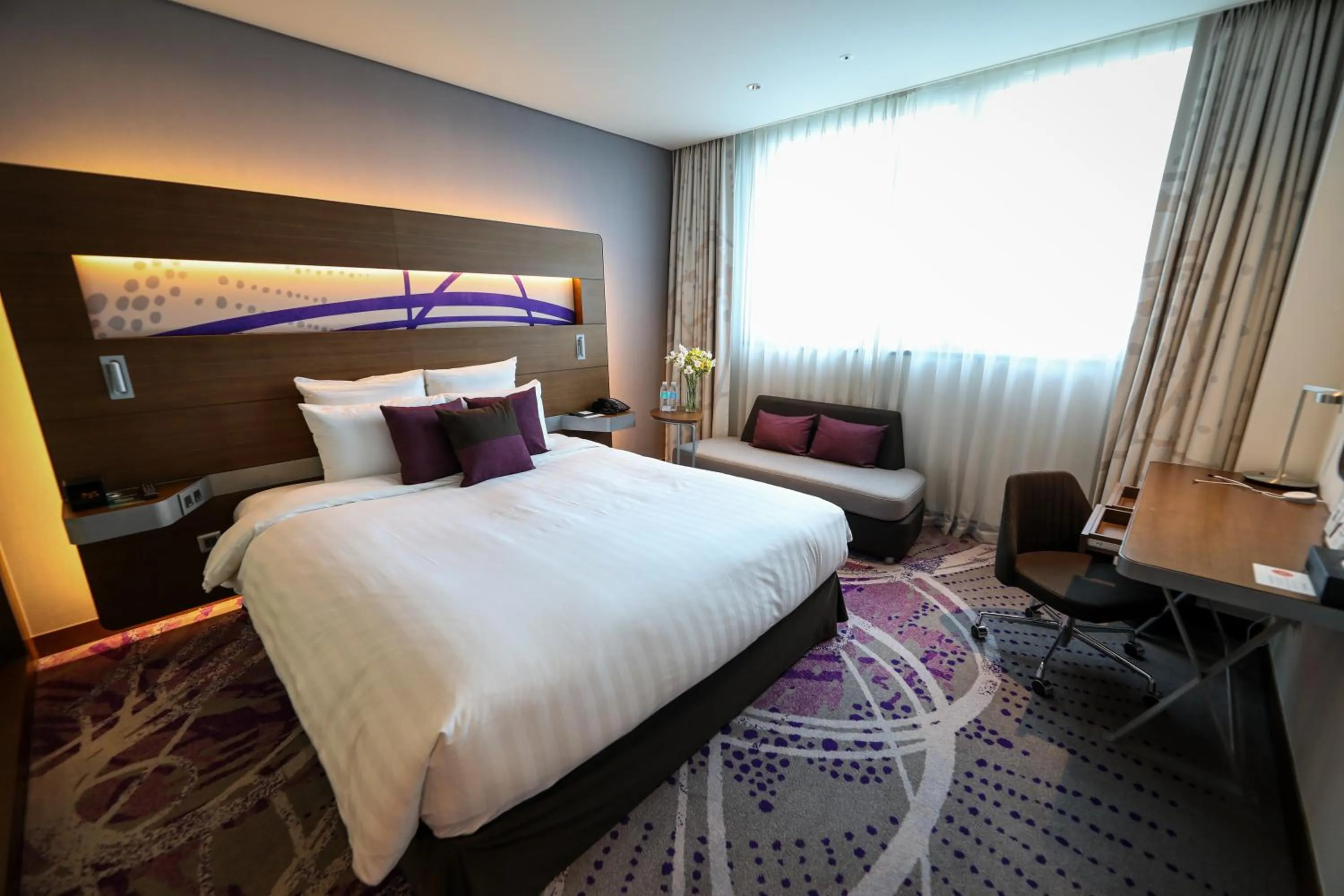 Bed in Novotel Ambassador Suwon