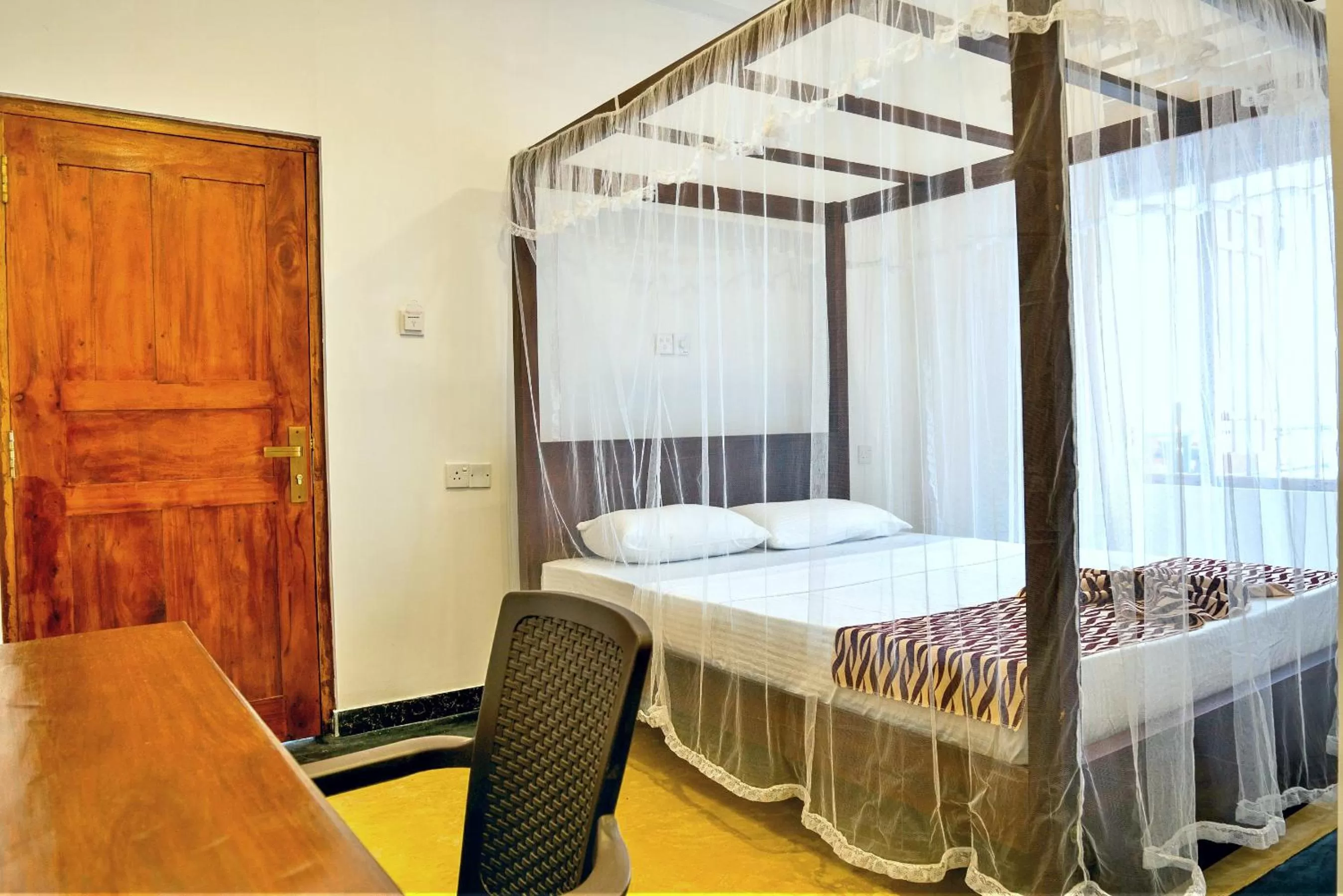 Bed in Ocean Bay Surf Resort Weligama