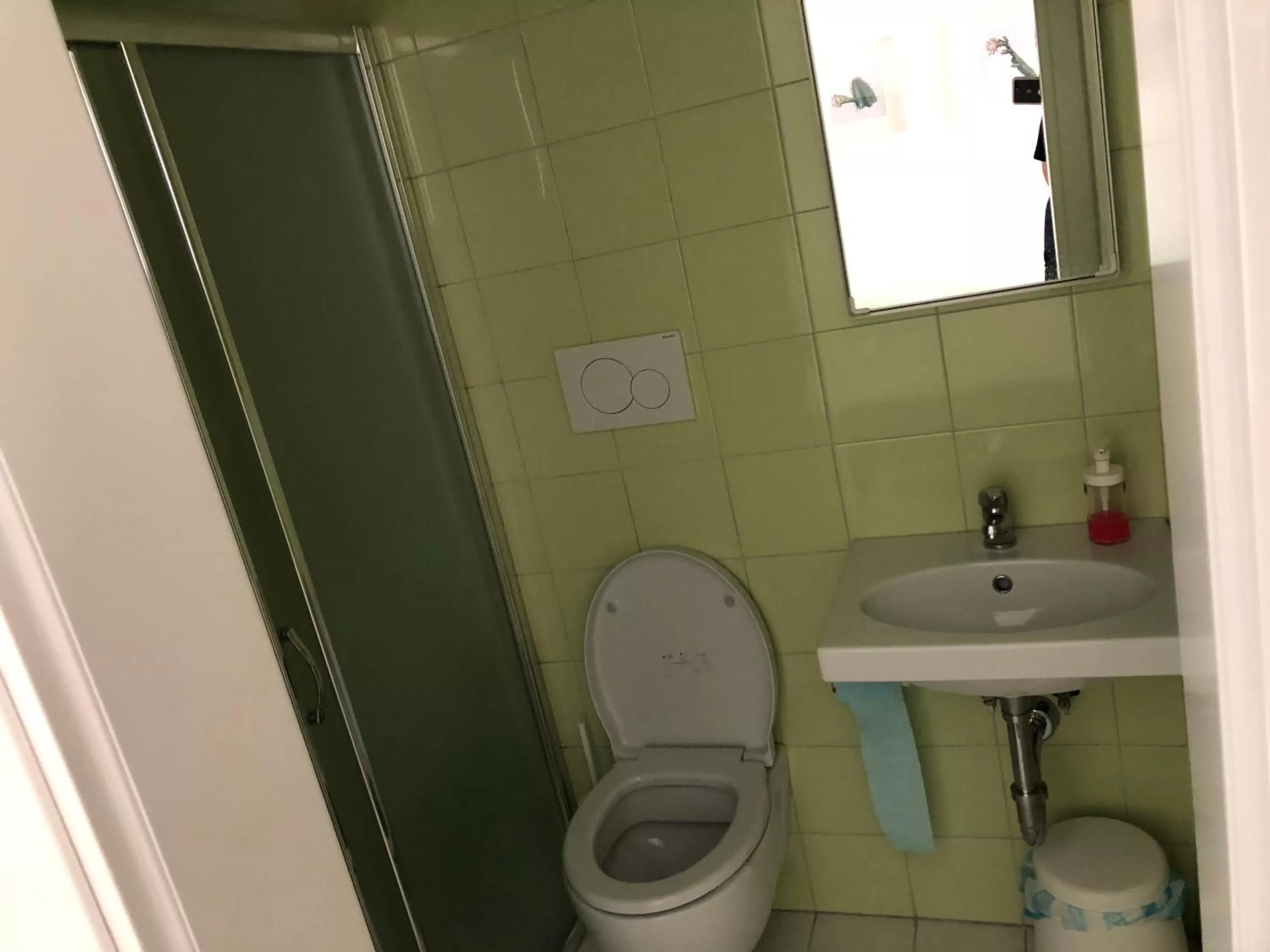 Bathroom in Aleksi rooms