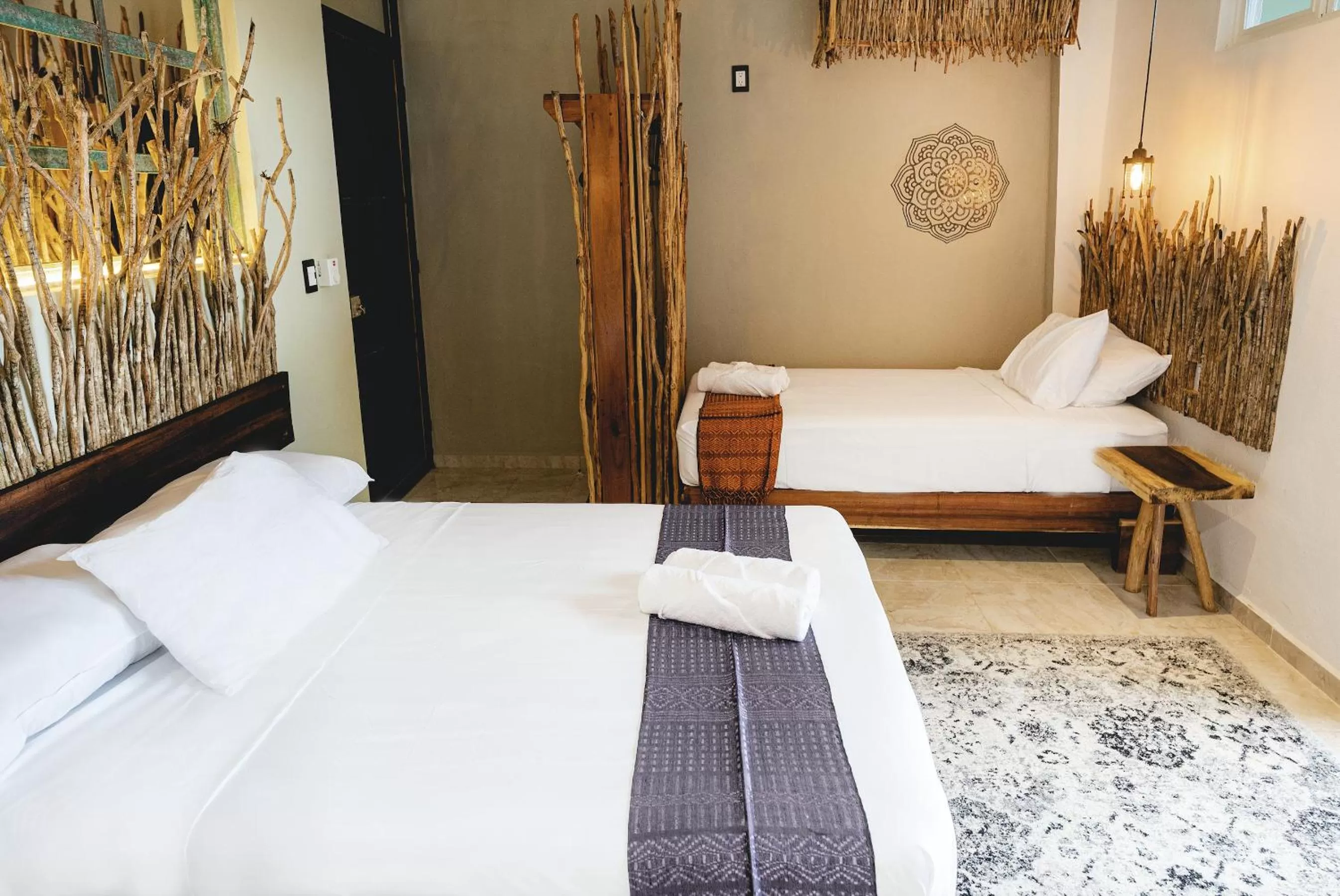 Bed in LA TULUMEÑA Boutique Hotel