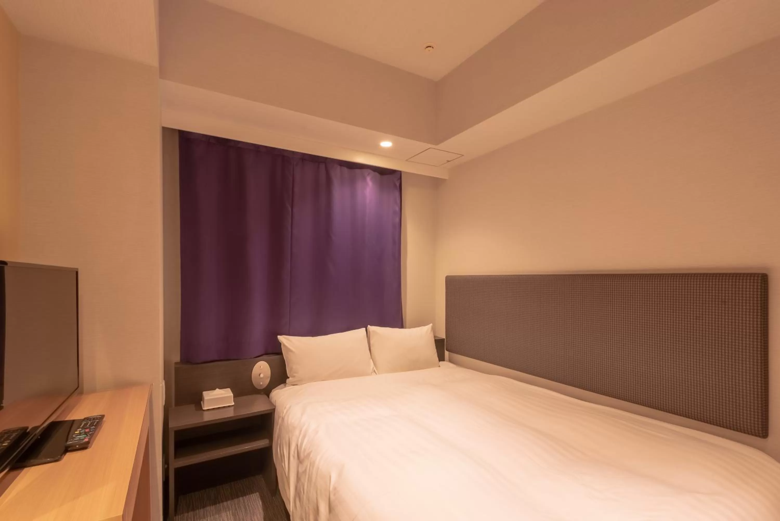 Bed in E Hotel Higashi Shinjuku