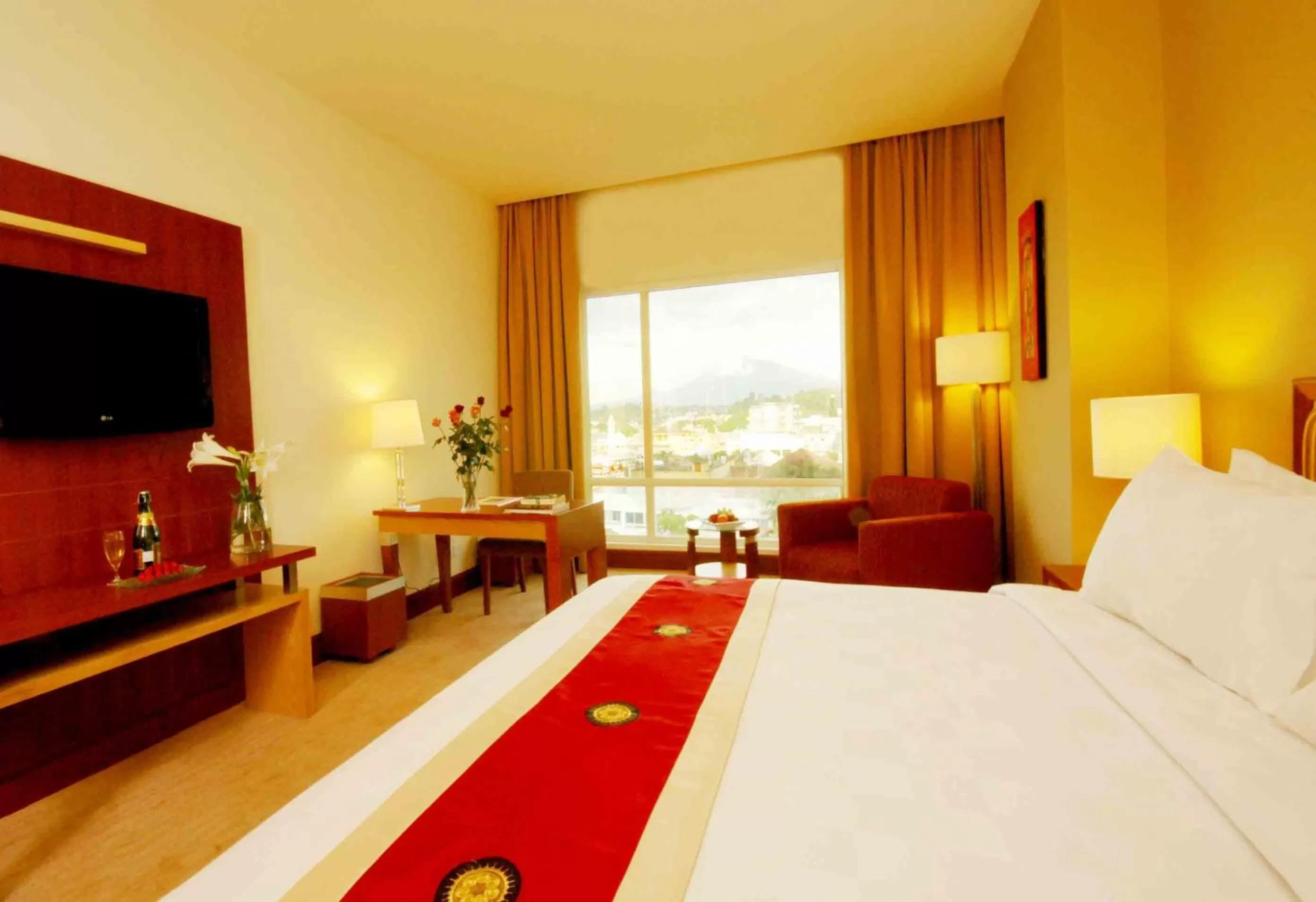Photo of the whole room, Bed in Swiss-Belhotel Maleosan Manado