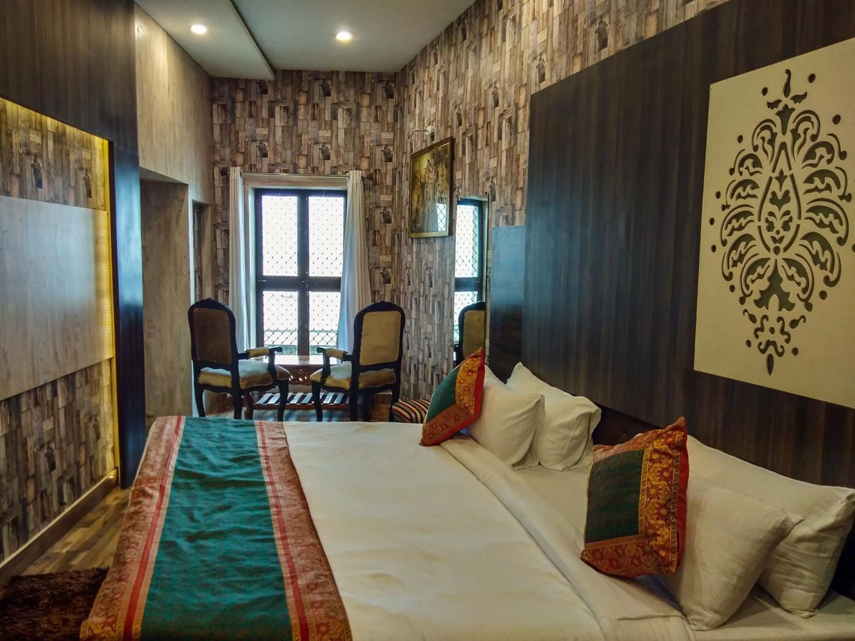 River view, Bed in Dwivedi Hotels Sri Omkar Palace