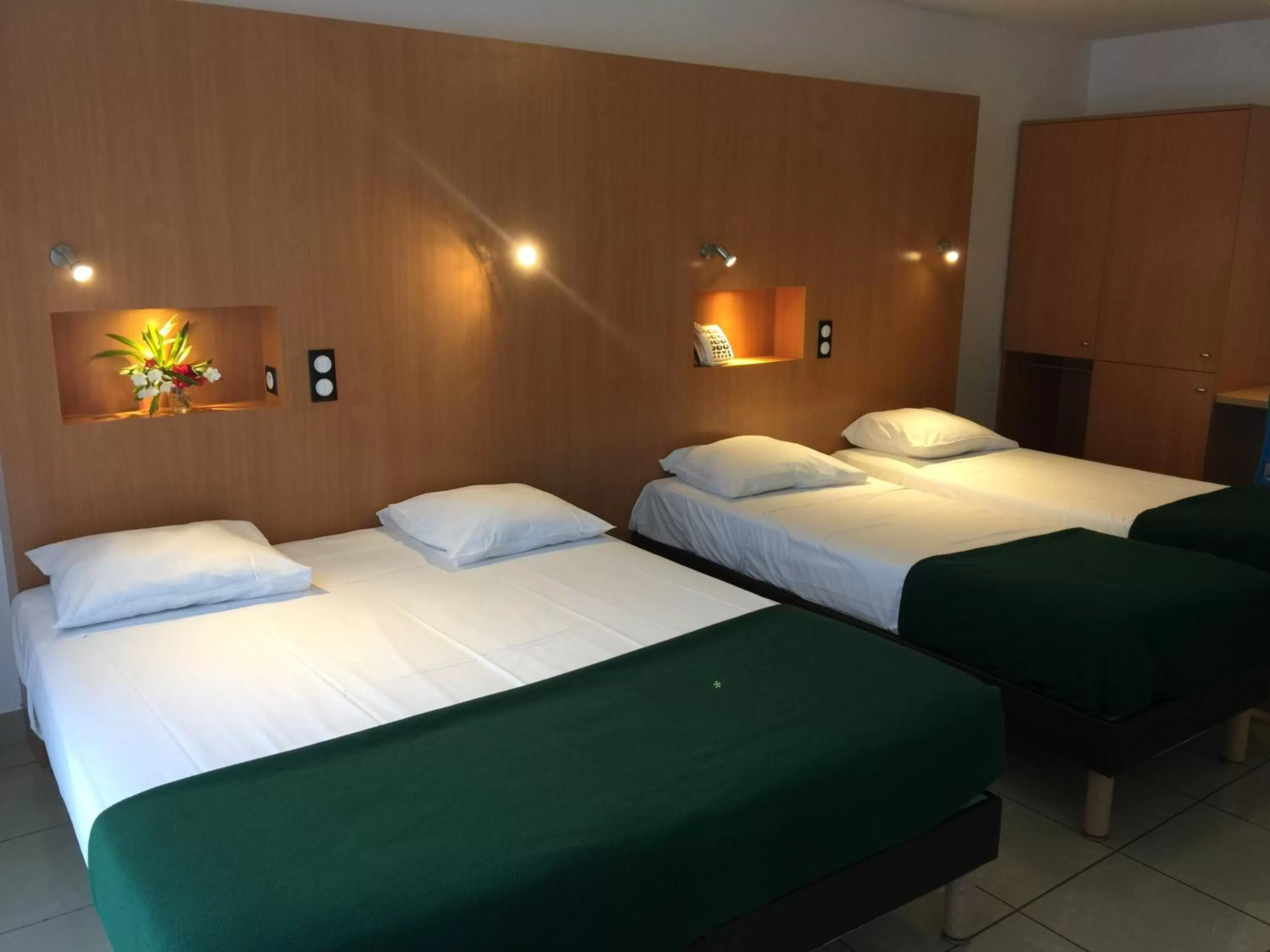 Photo of the whole room, Bed in Karaibes Hotel