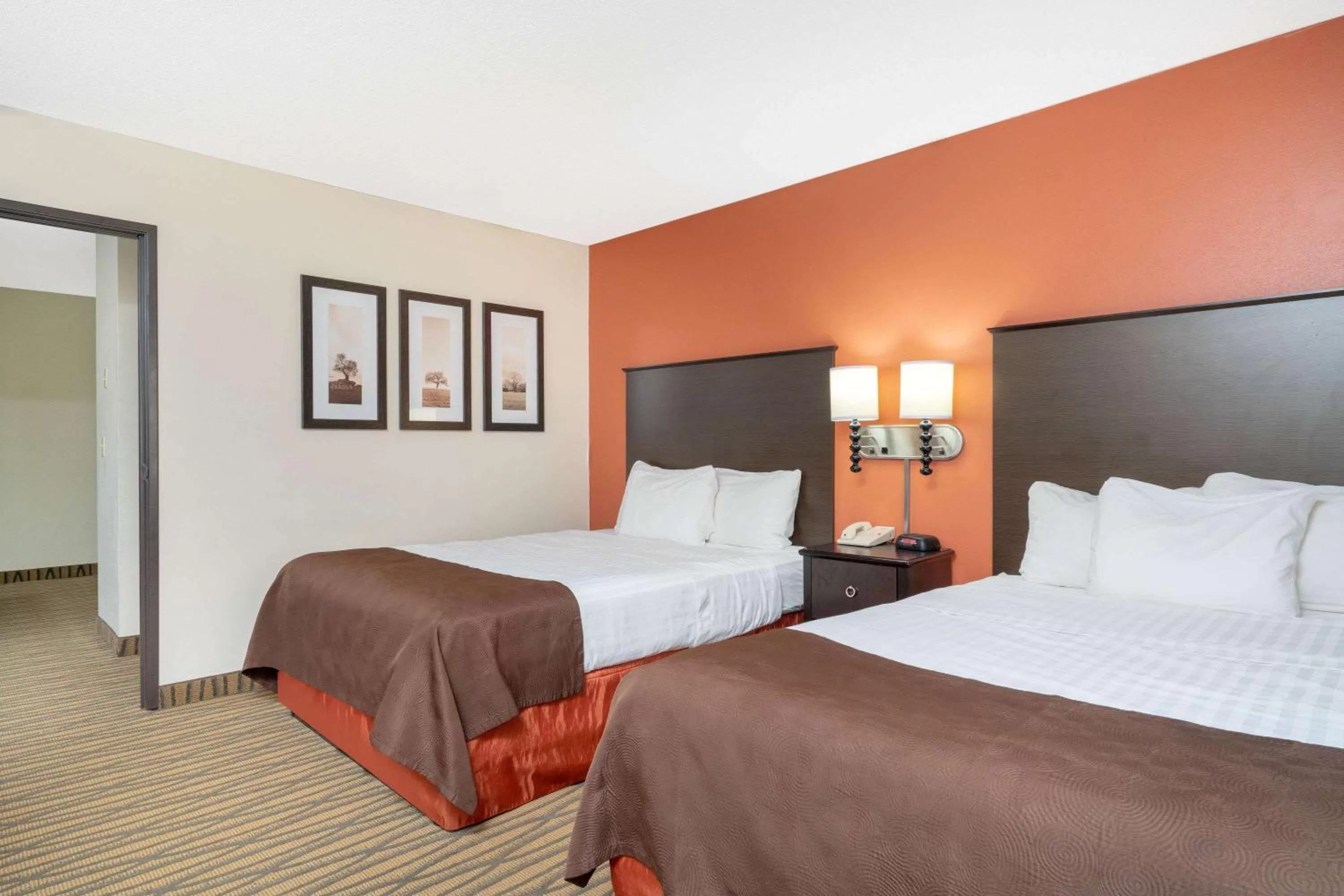 Photo of the whole room, Bed in AmericInn by Wyndham Rogers