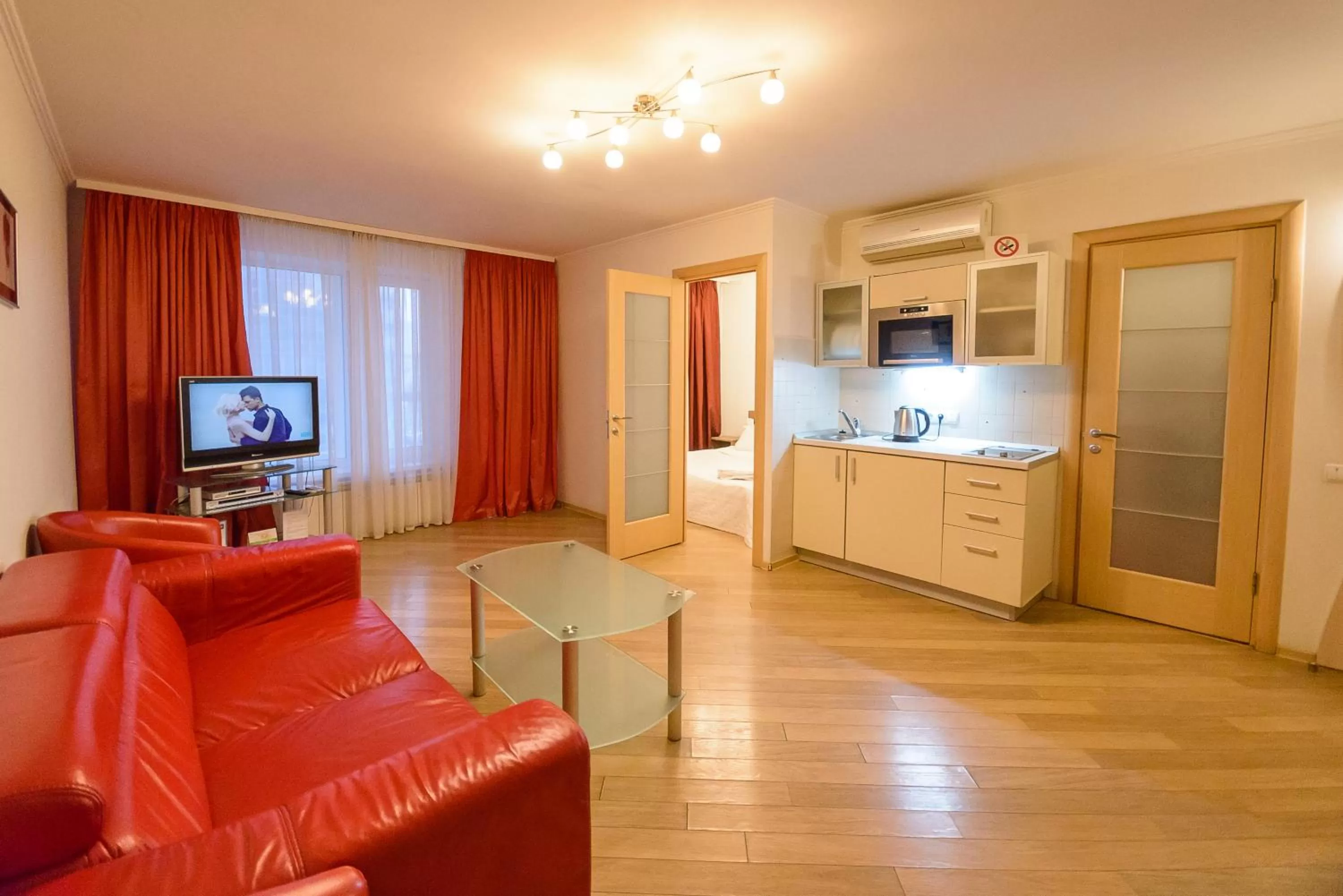 Living room, Kitchen/Kitchenette in Partner Guest House