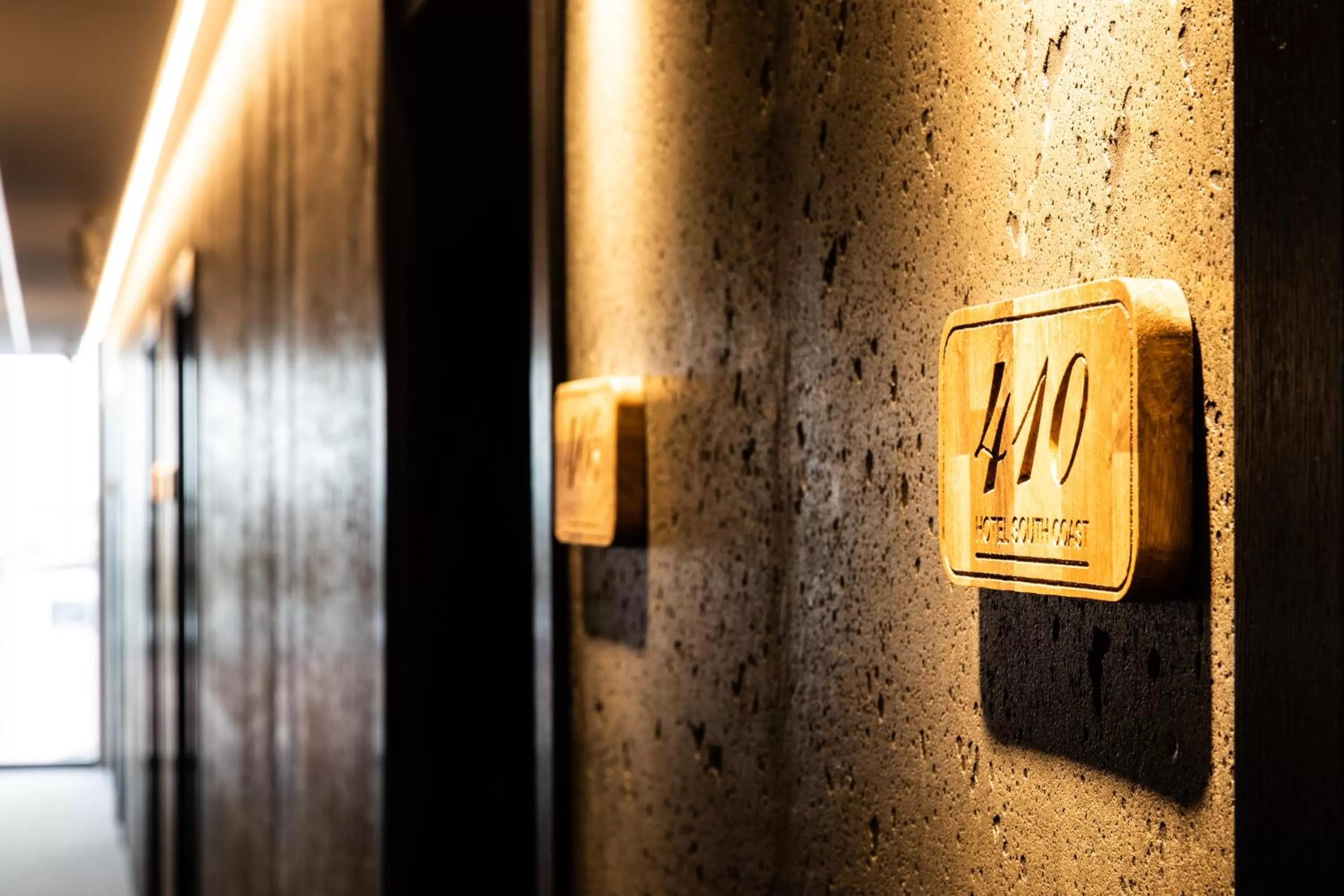 Property logo or sign in Hotel South Coast