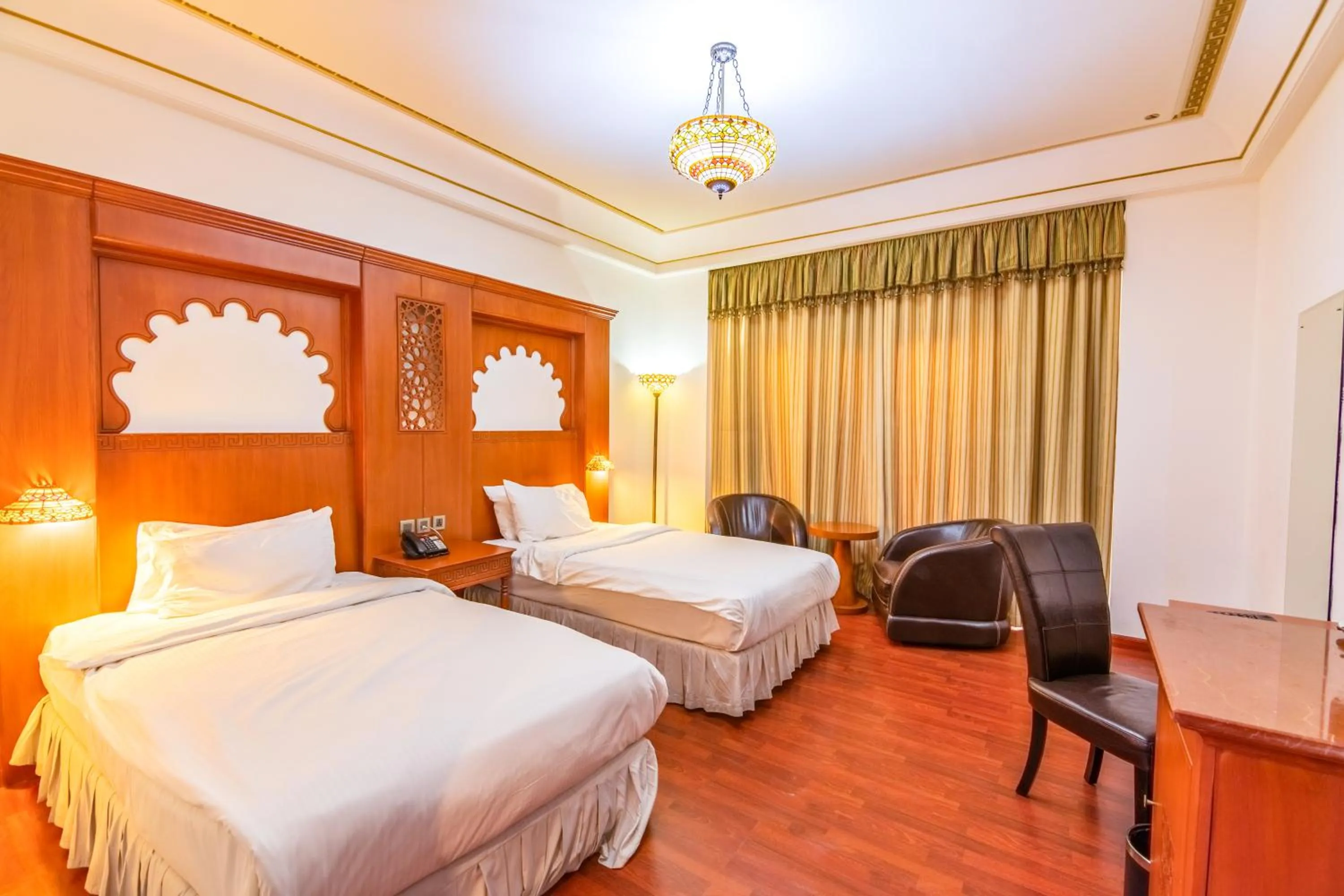 Bed in The Platinum Hotel