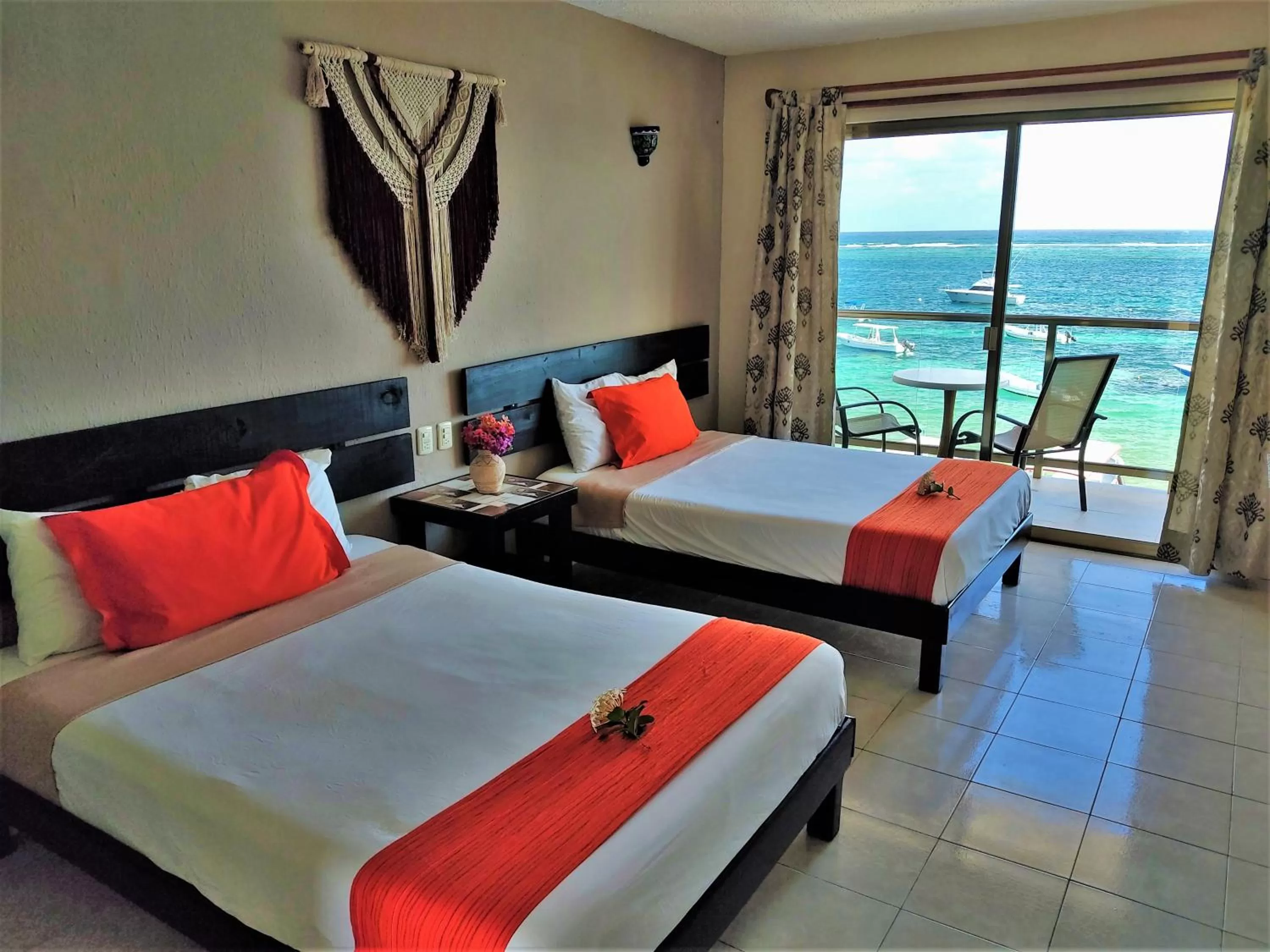 Bedroom, Bed in Hacienda Morelos Beachfront Hotel