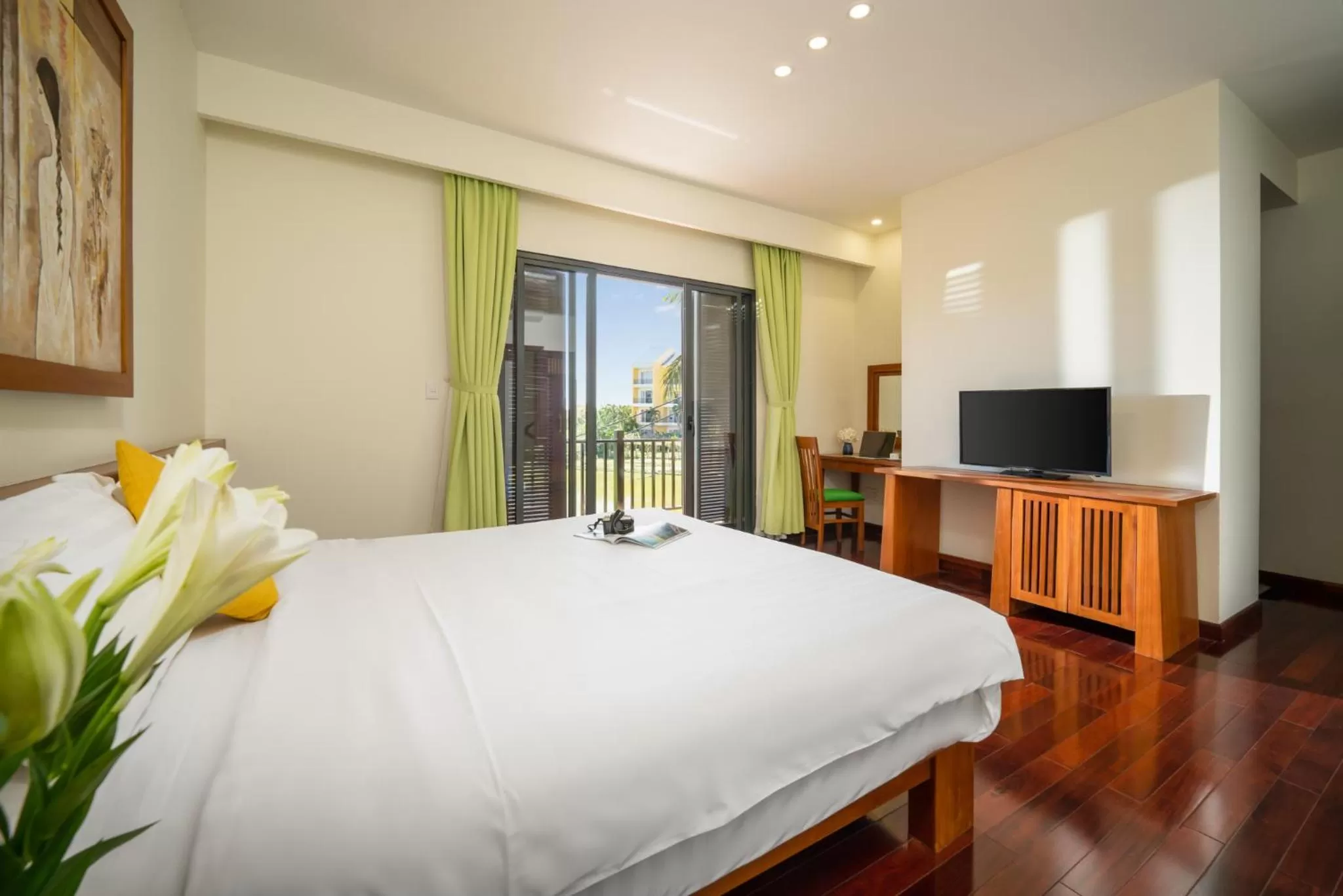 Bed, TV/Entertainment Center in Palm Village Hoian - STAY 24H