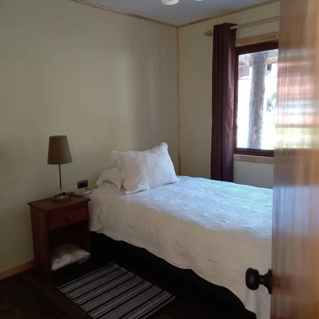 Bed in Cabanas Senderos Puyuhuapi