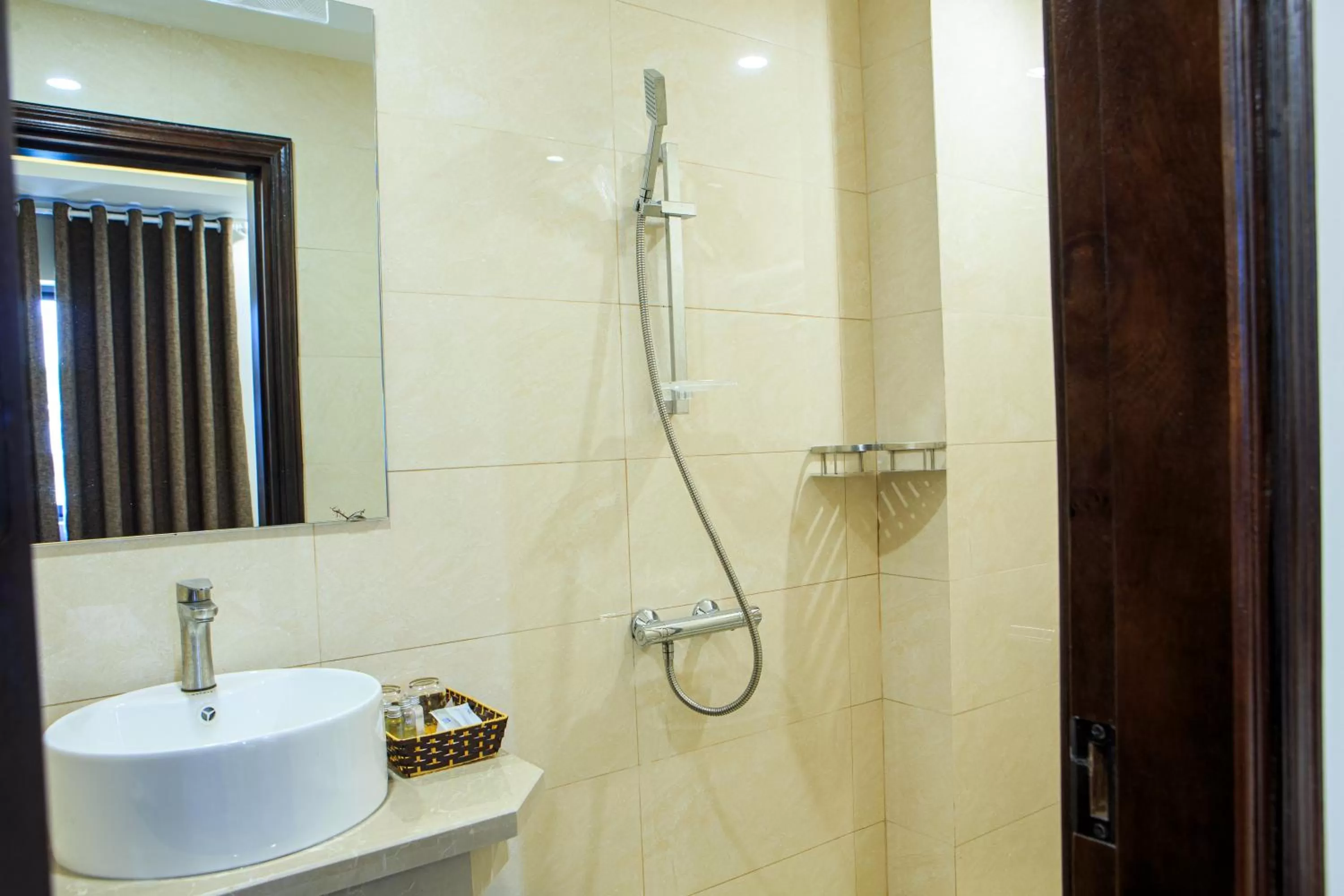 Bathroom in Paloma Hotel & Apartment