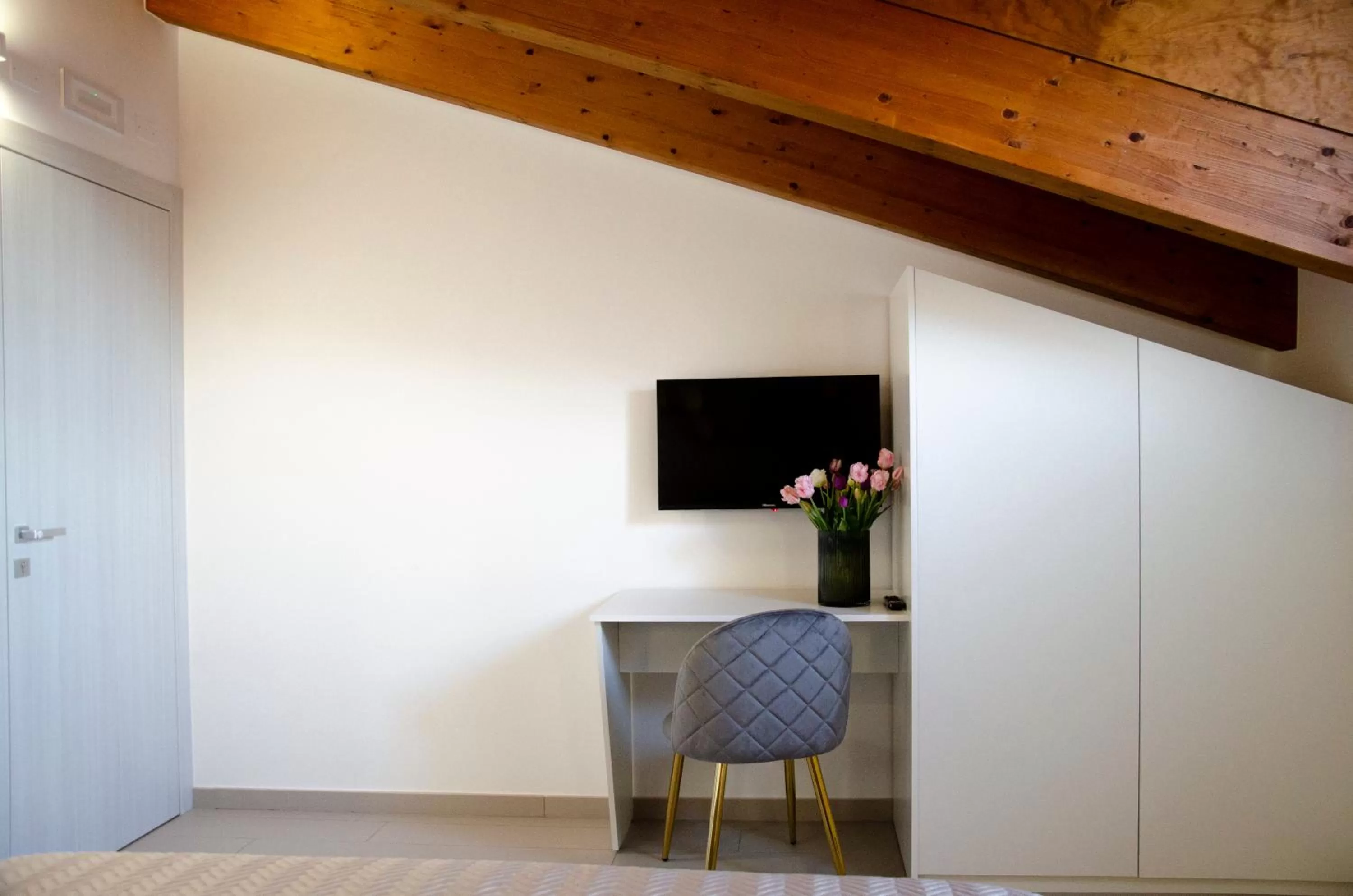 Bedroom, TV/Entertainment Center in Donna Elena Rooms