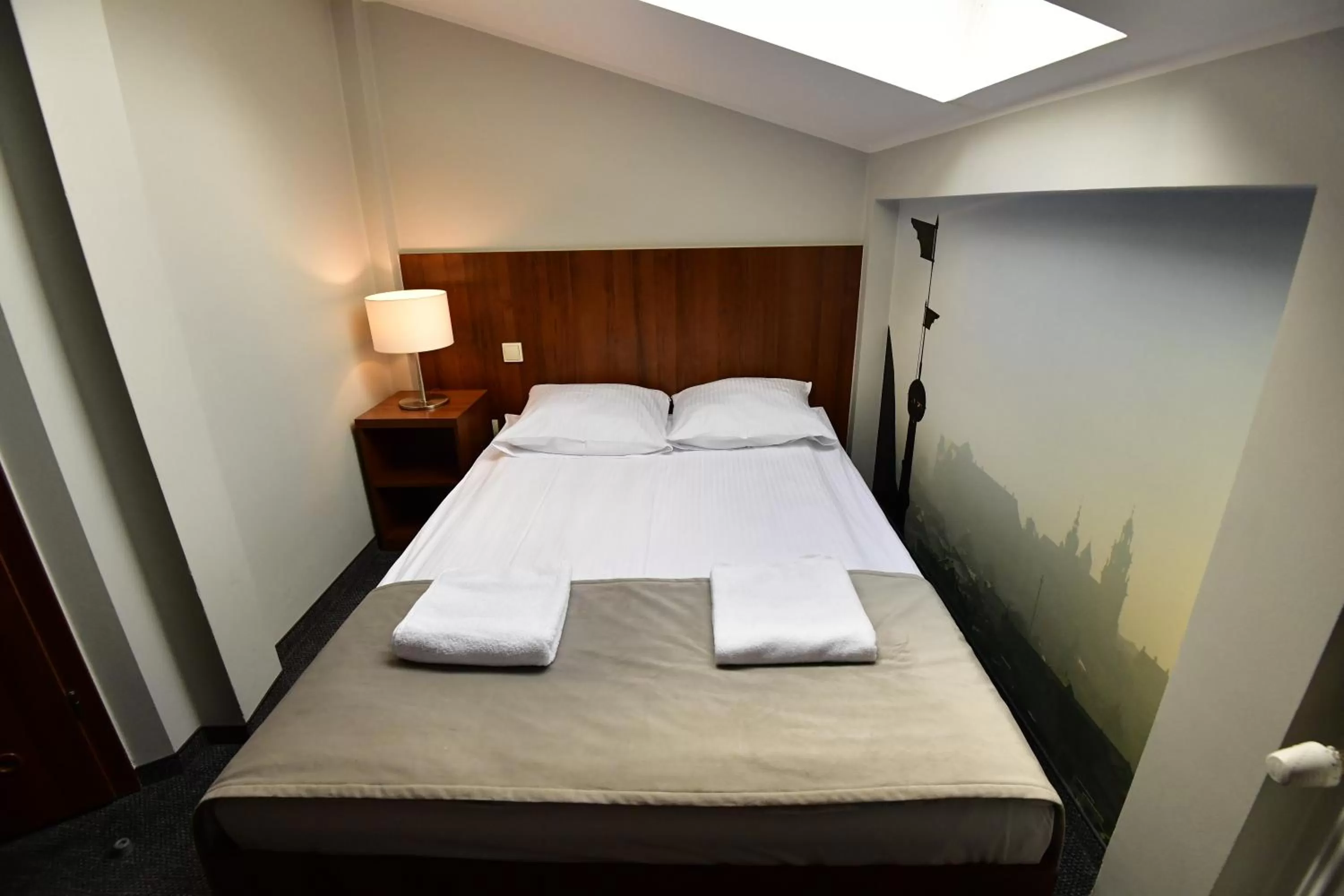 Bed in Hotel Downtown Kraków