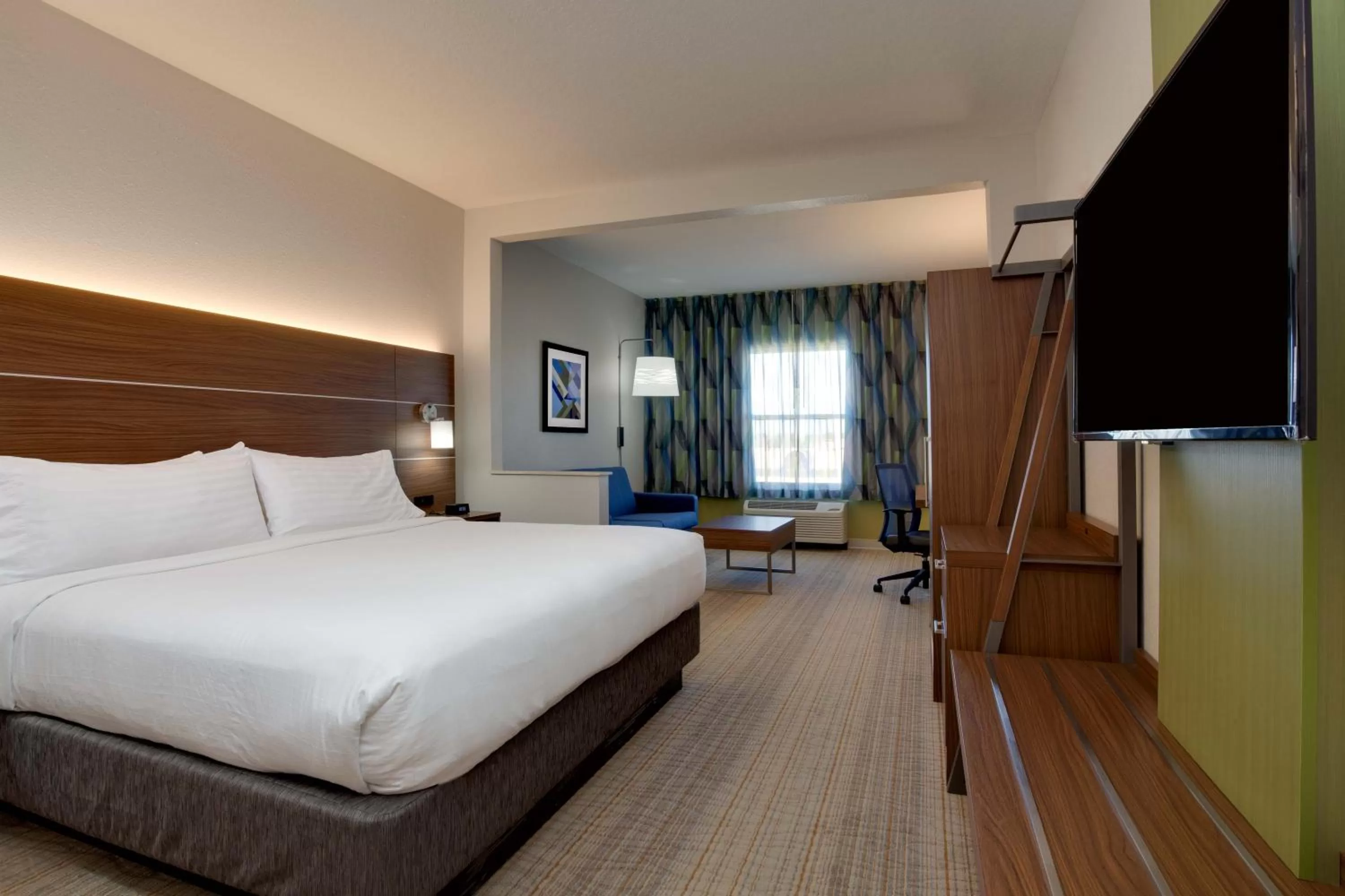 Bedroom, Bed in Holiday Inn Express & Suites Orlando International Airport by IHG