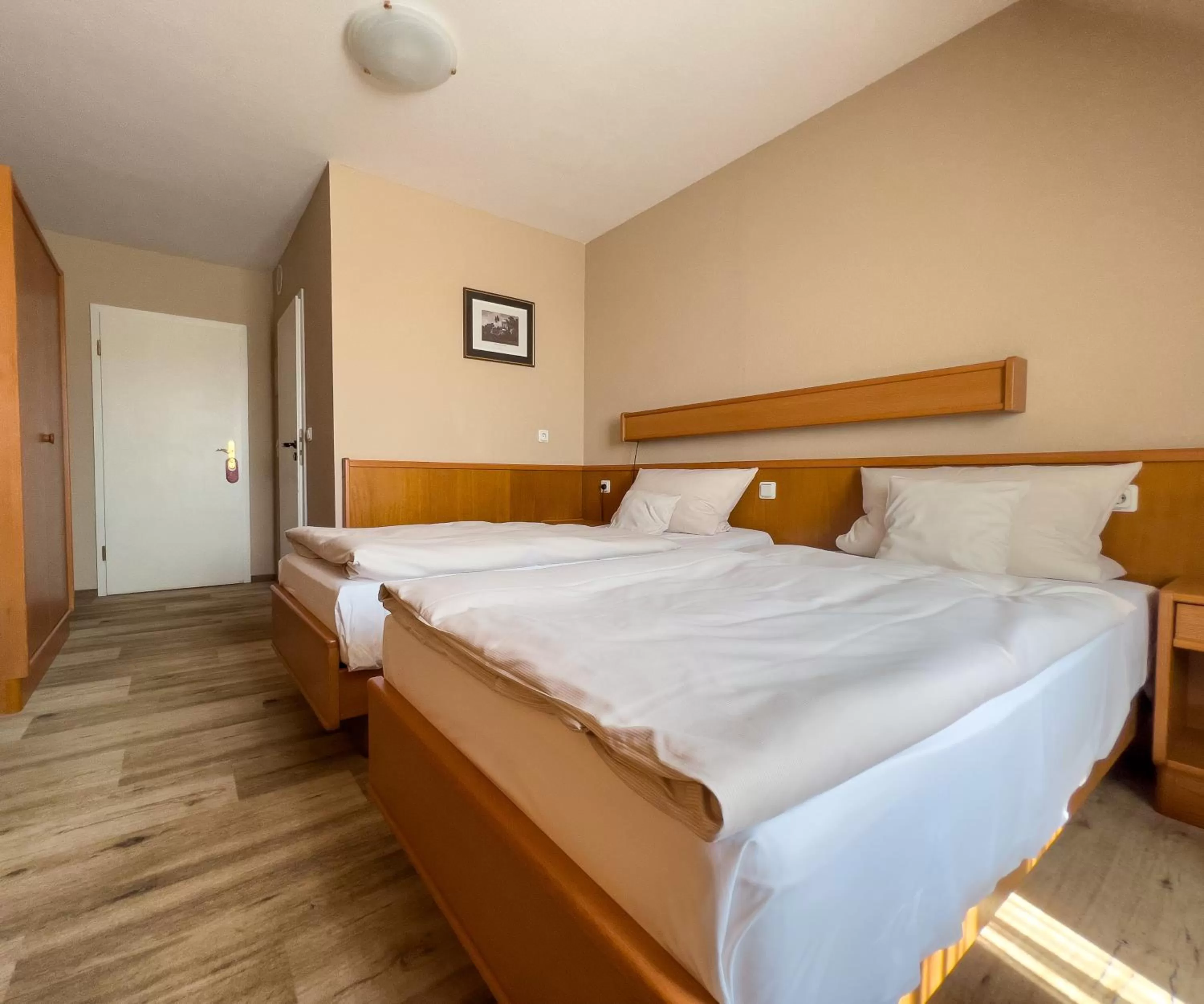 Bed in Hotel Landhaus Wörlitzer Hof