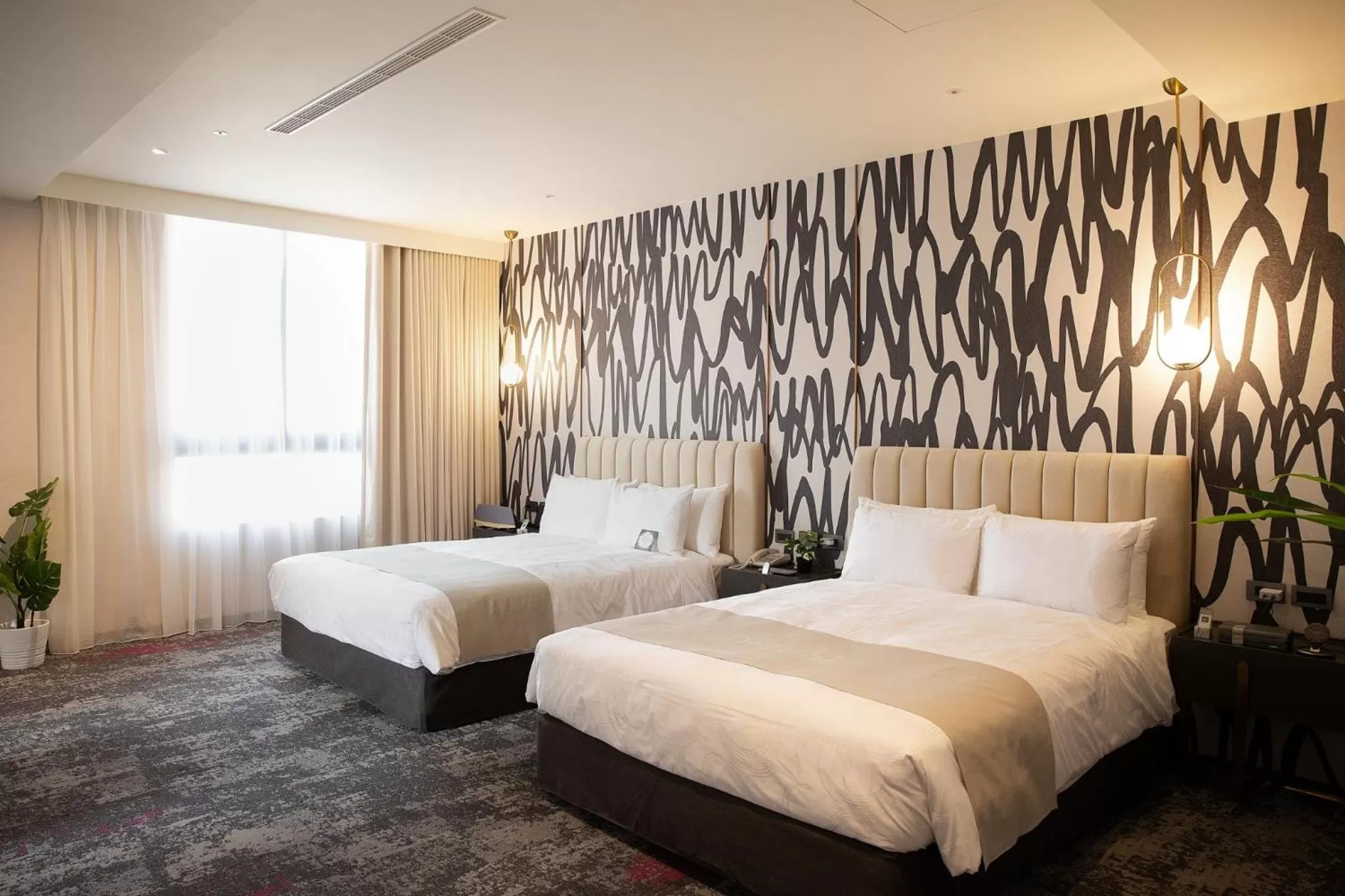 Bed in Tenz Go Hotel