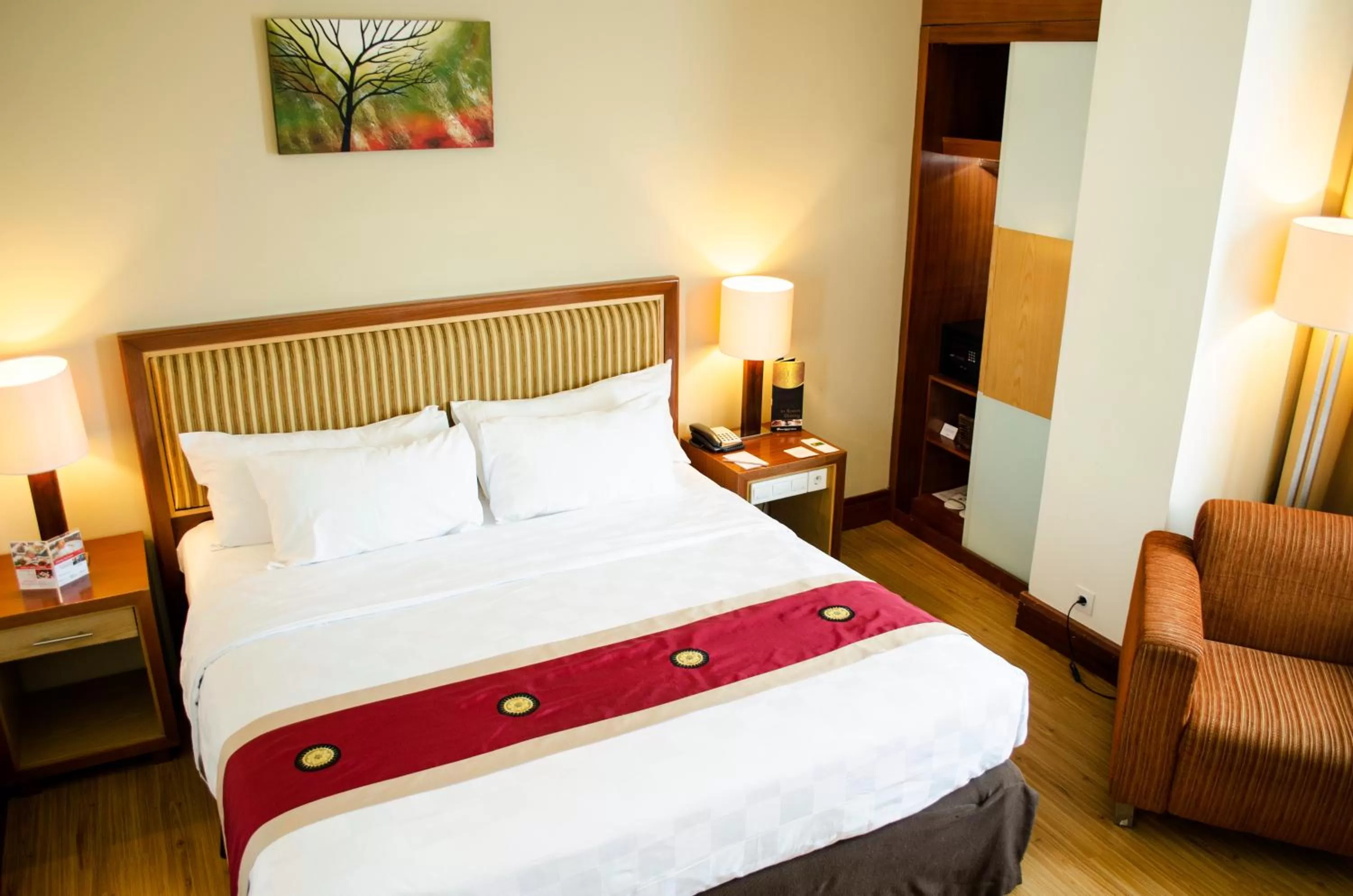 Bed in Swiss-Belhotel Maleosan Manado