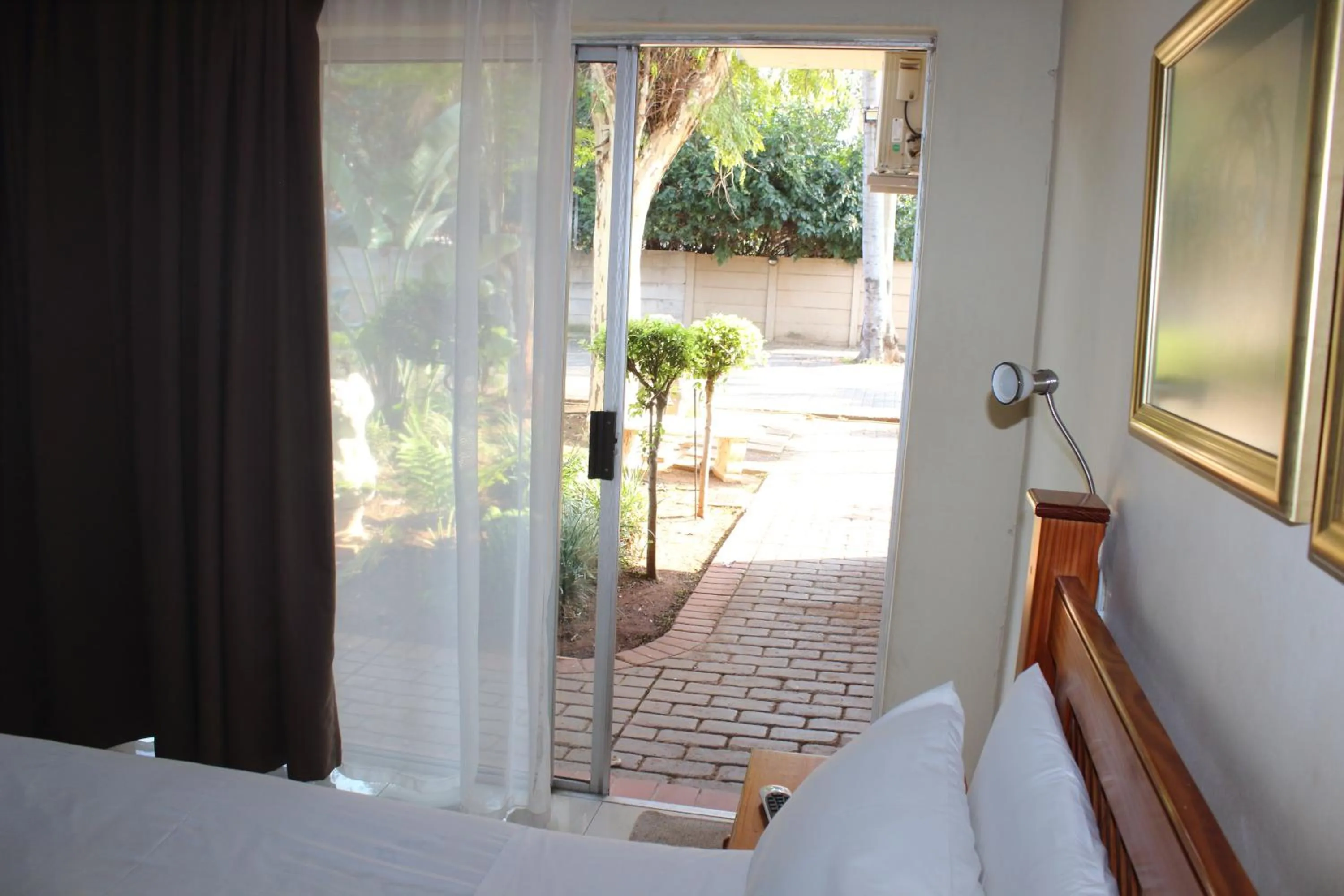 Patio, Bed in Purple Olive Guest House