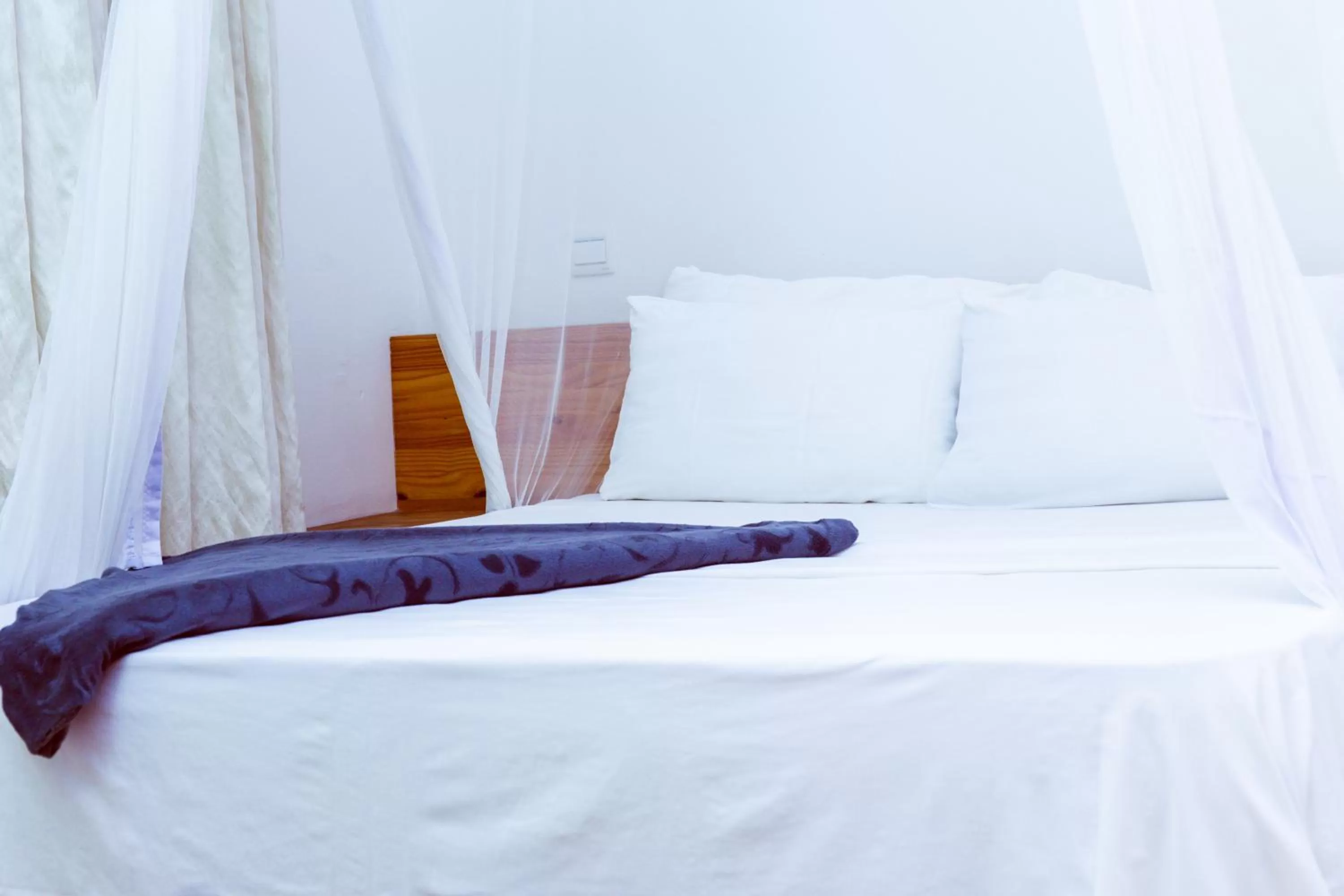 Bed in Triniti Airport Hotel