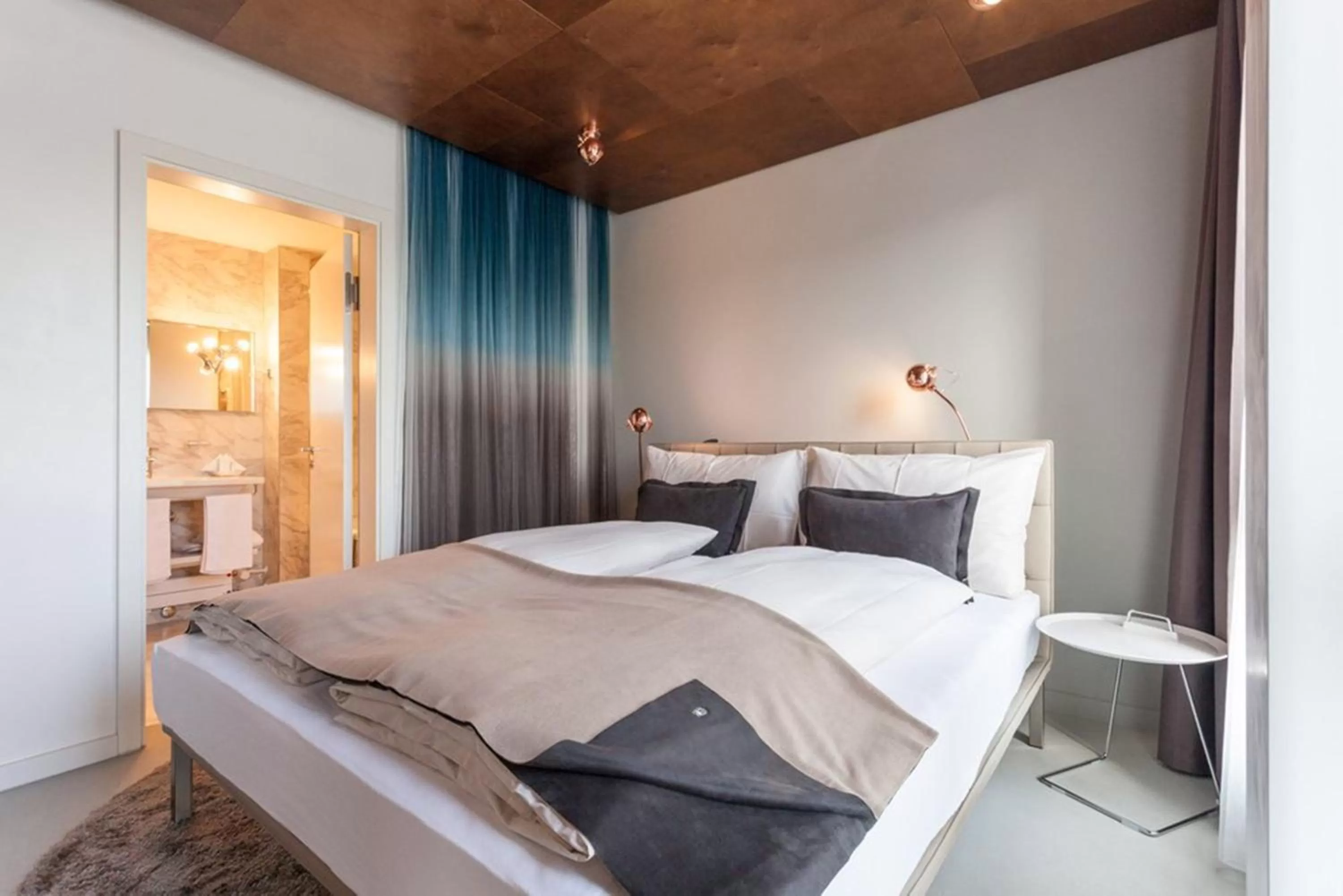 Bed in EMA House Hotel Suites