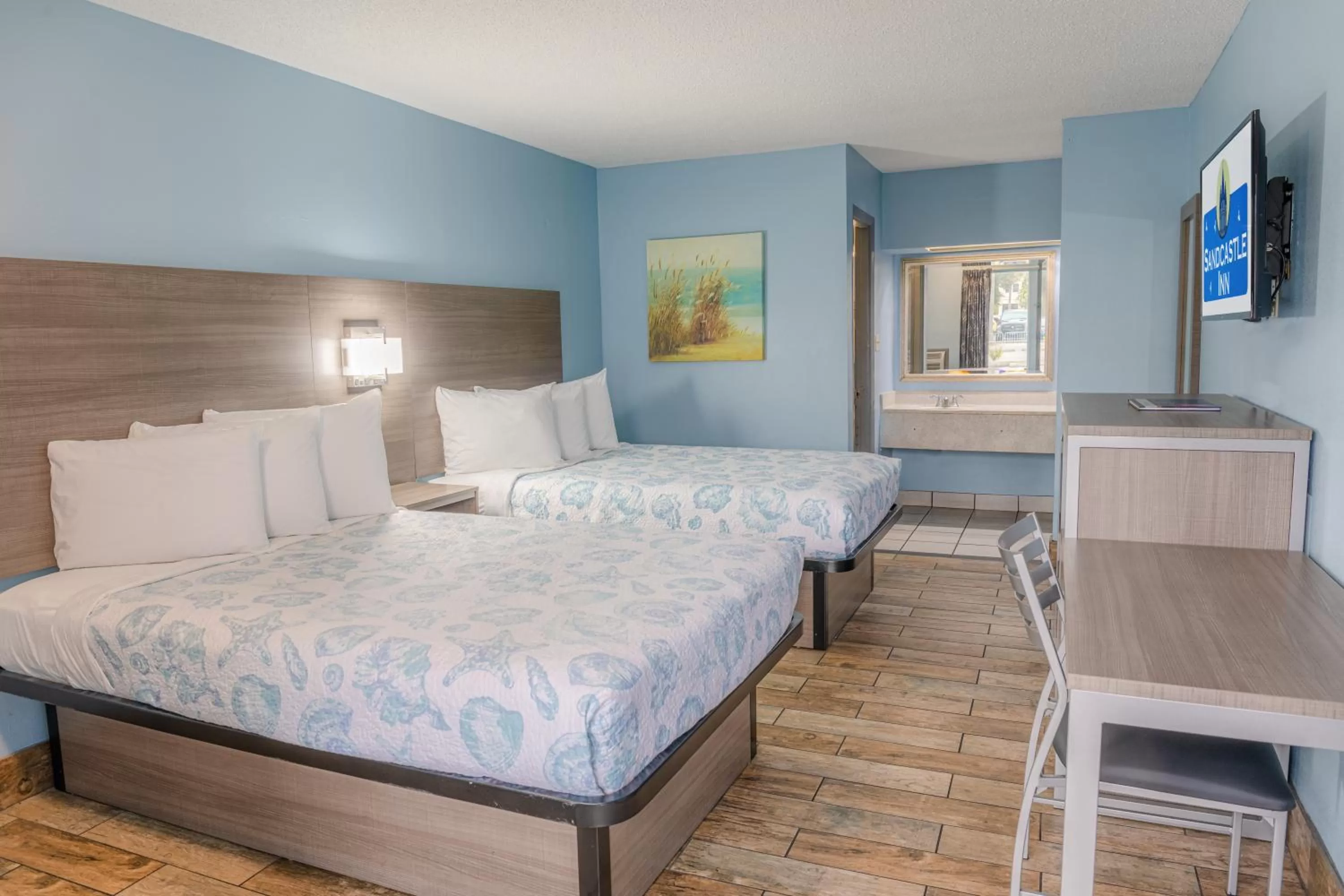 Bed in Sandcastle Inn