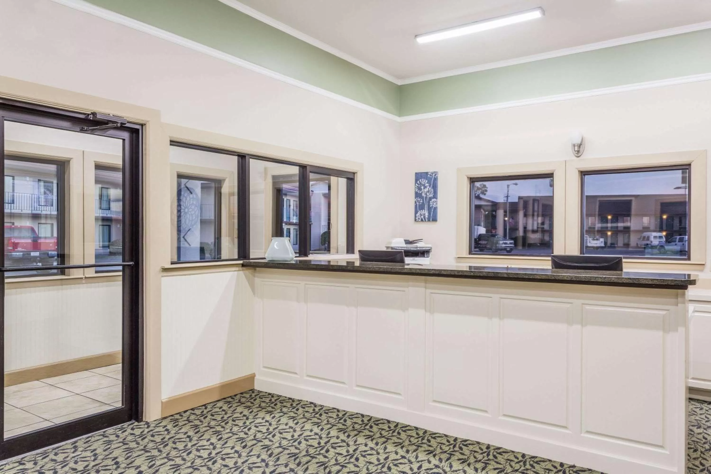 Lobby or reception in Super 8 by Wyndham Adel GA I-75