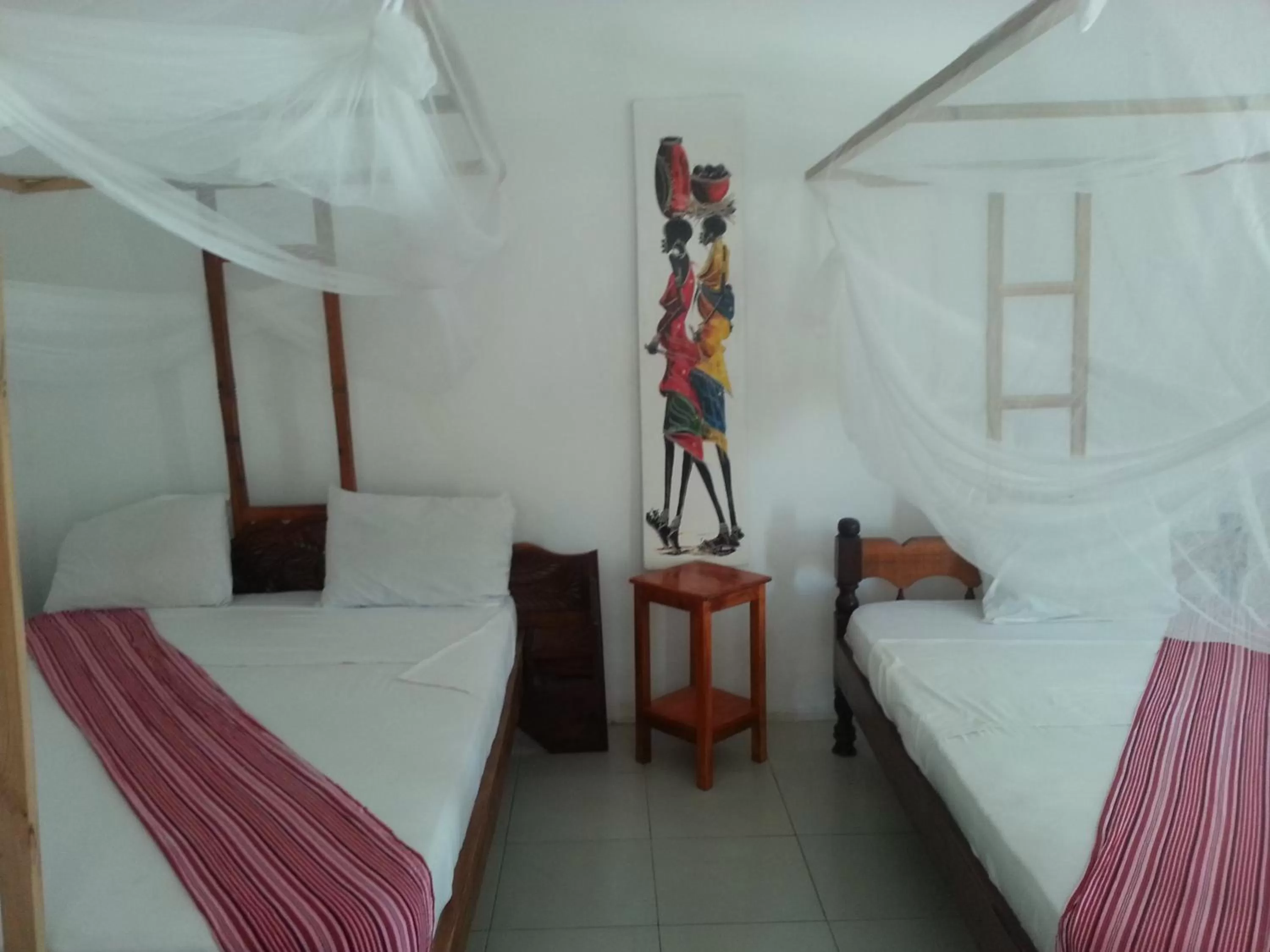 Bed in Ebony & Ivory Beach Bungalows