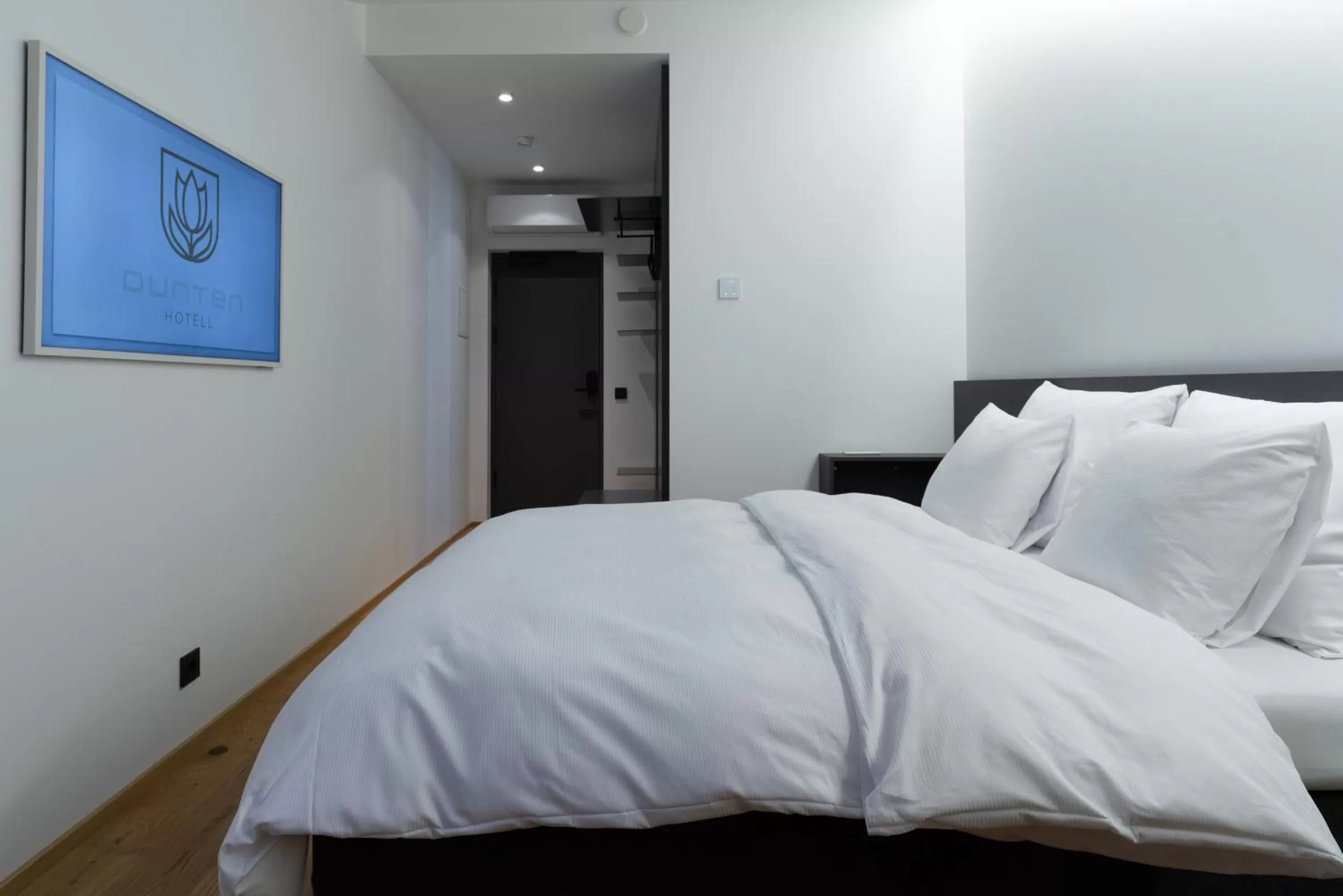 Bed in Dunten Hotel