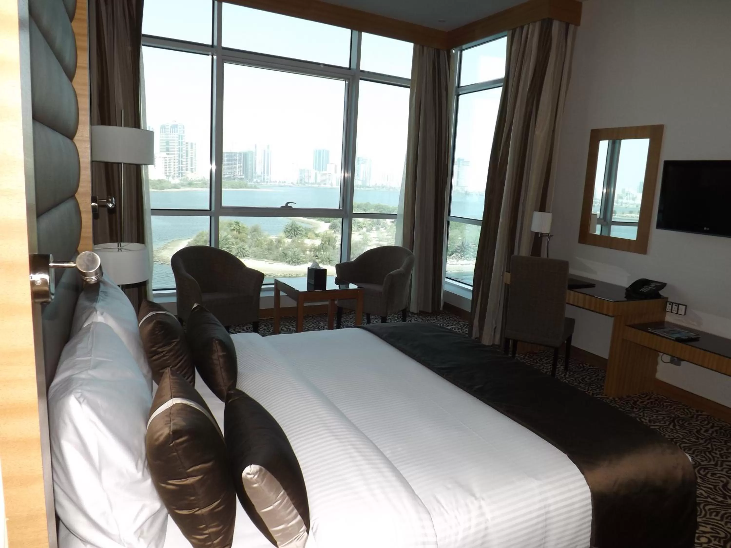 View (from property/room), Bed in Copthorne Hotel Sharjah
