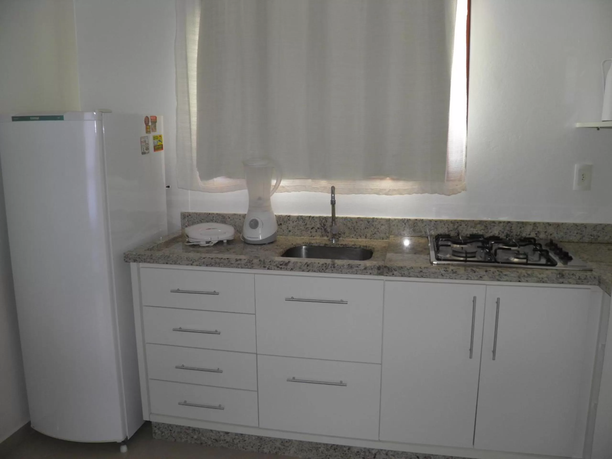 Kitchen or kitchenette in Pousada Mar de Cristal