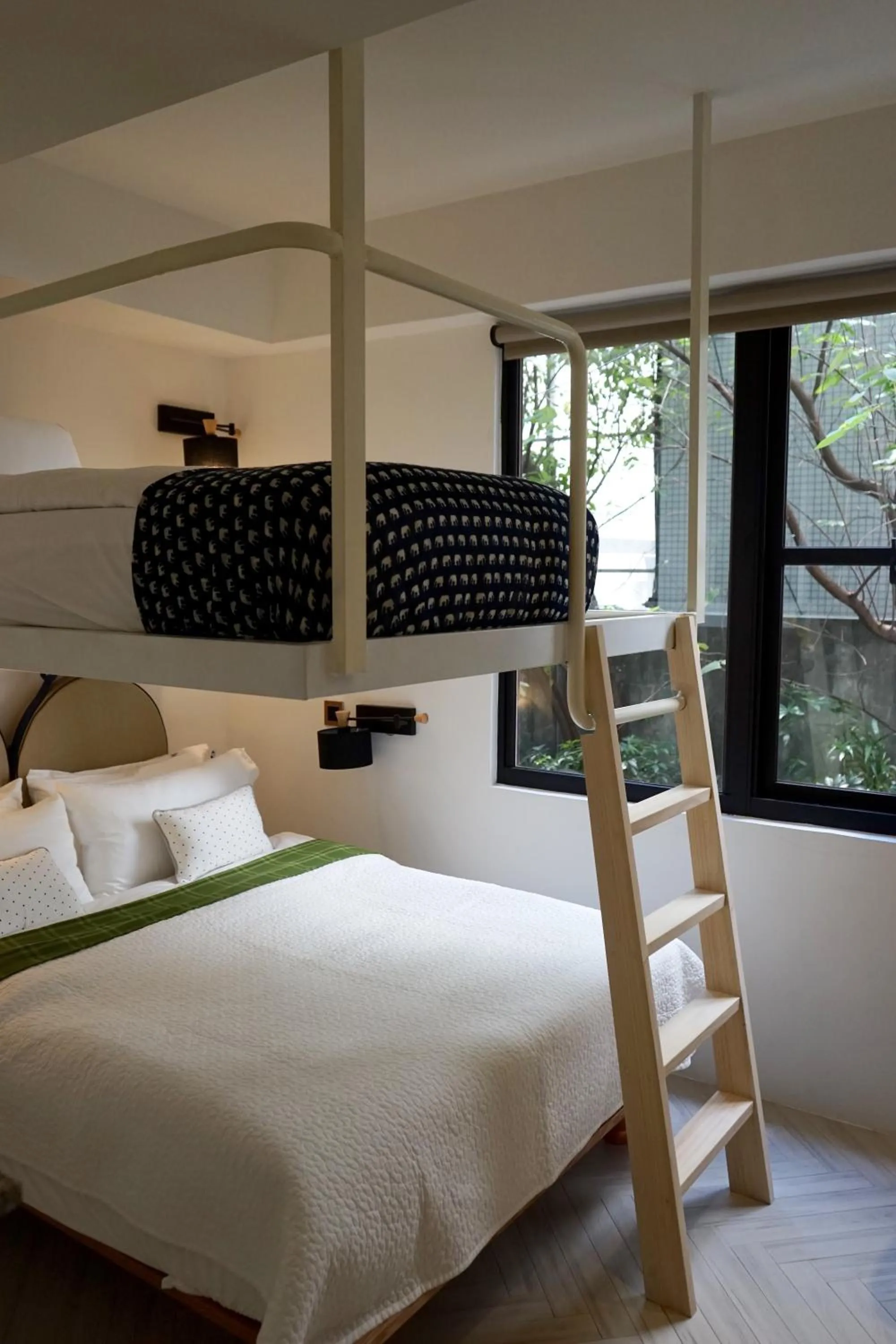 Bed in NiHao Café Hotel