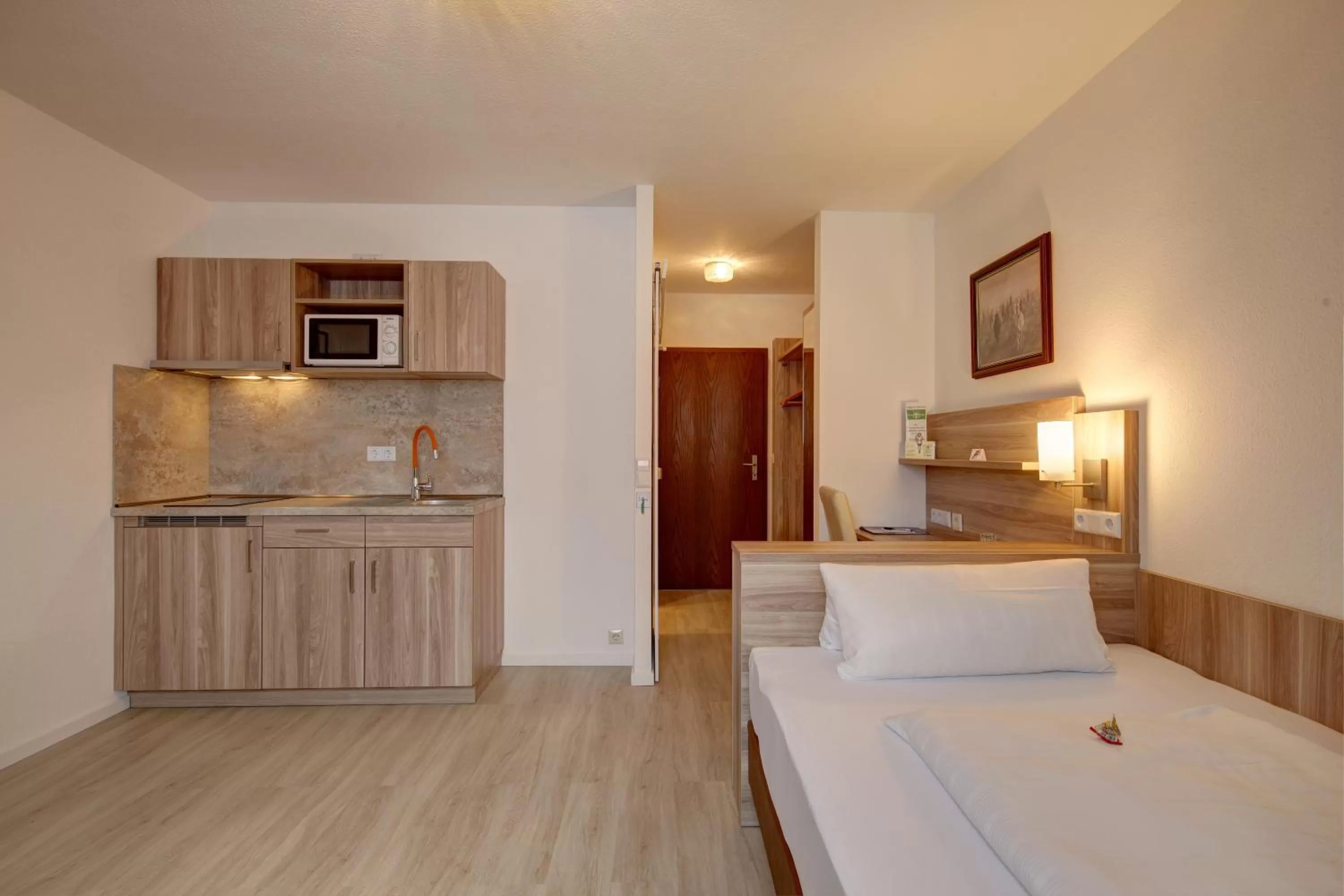 Bed in Aparthotel Deutschmeister