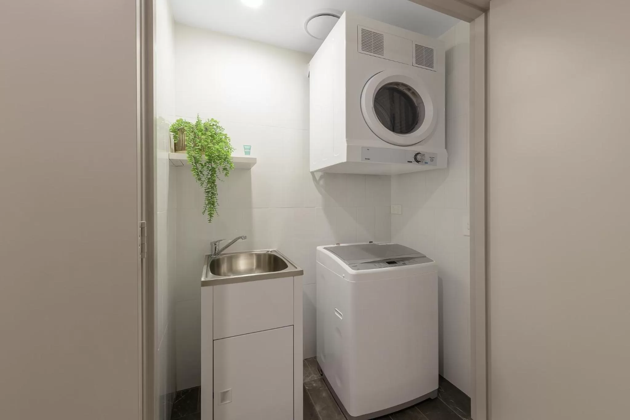 laundry in Meriton Suites Herschel Street, Brisbane