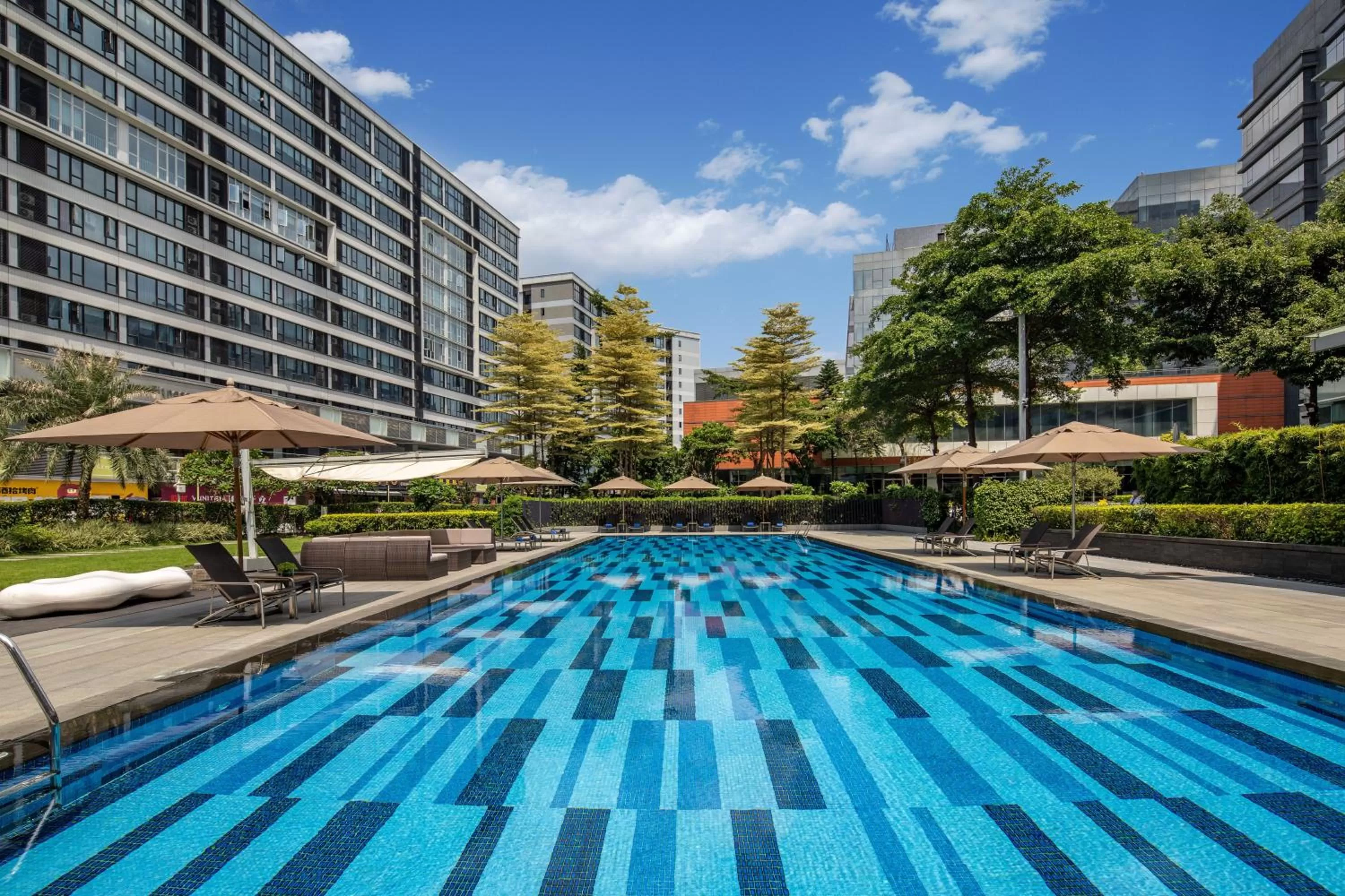 Swimming pool in Crowne Plaza Guangzhou Huadu by IHG
