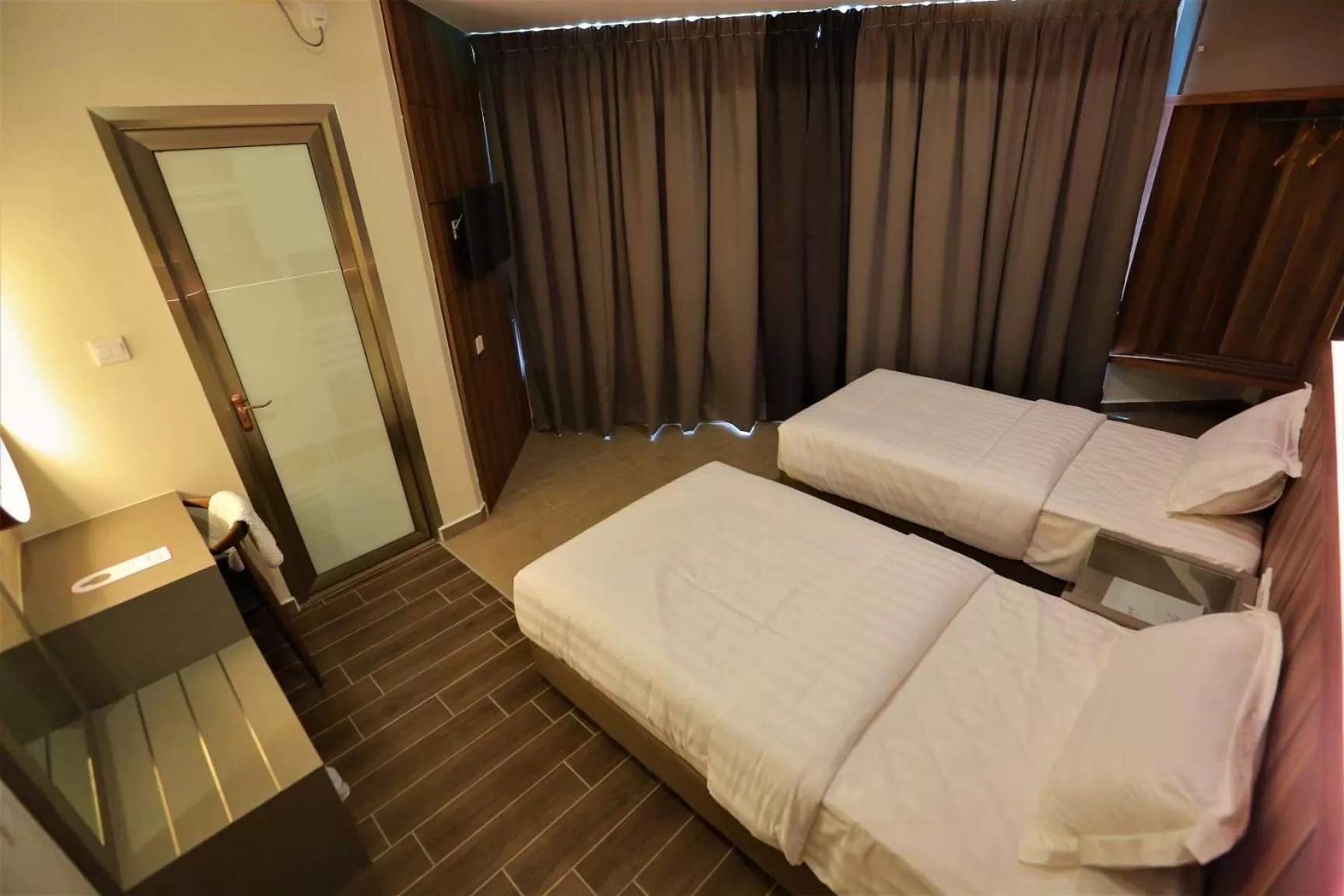 Bed in Pantai Regal Boutique Hotel