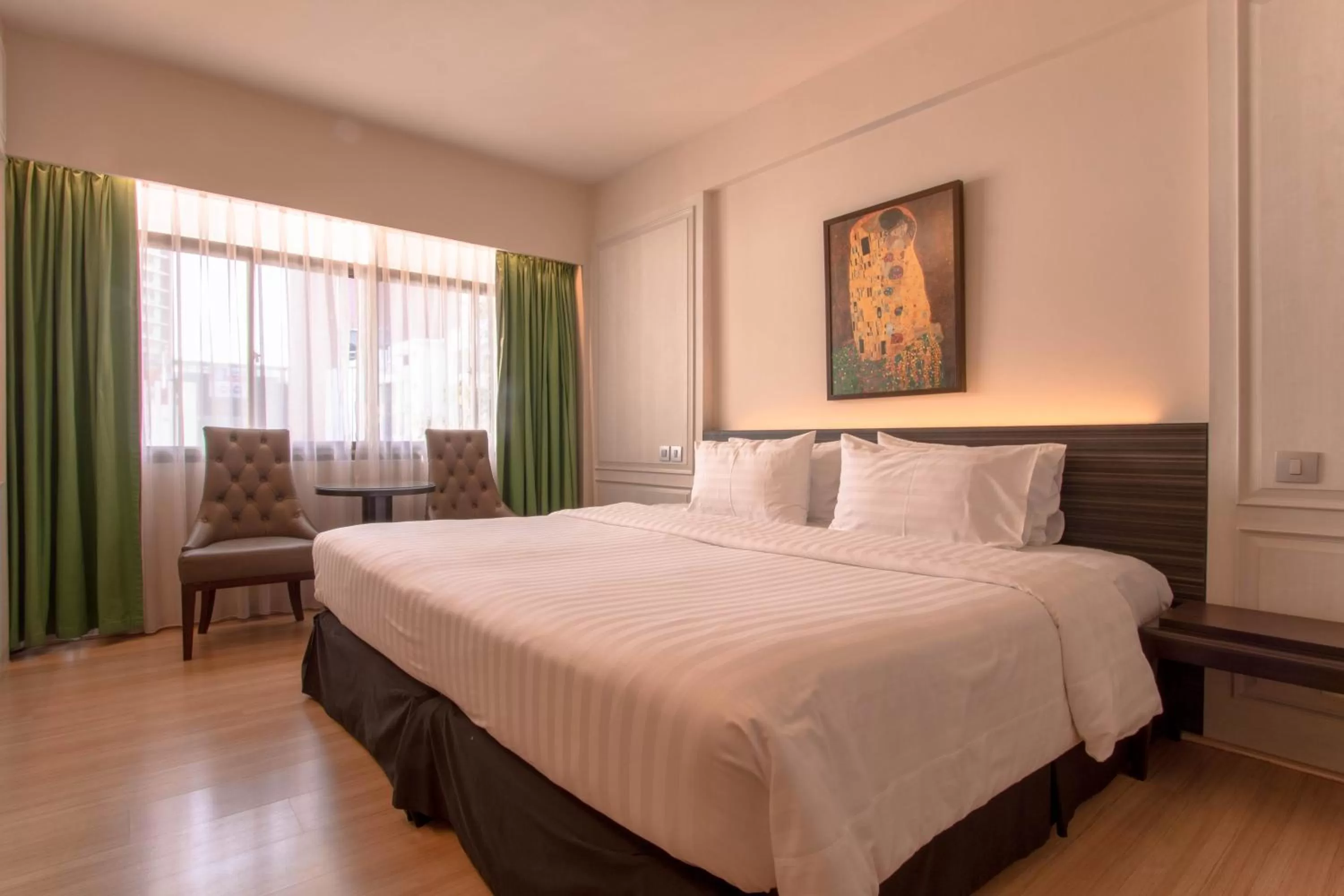 Bed in The Residence Rajtaevee Hotel