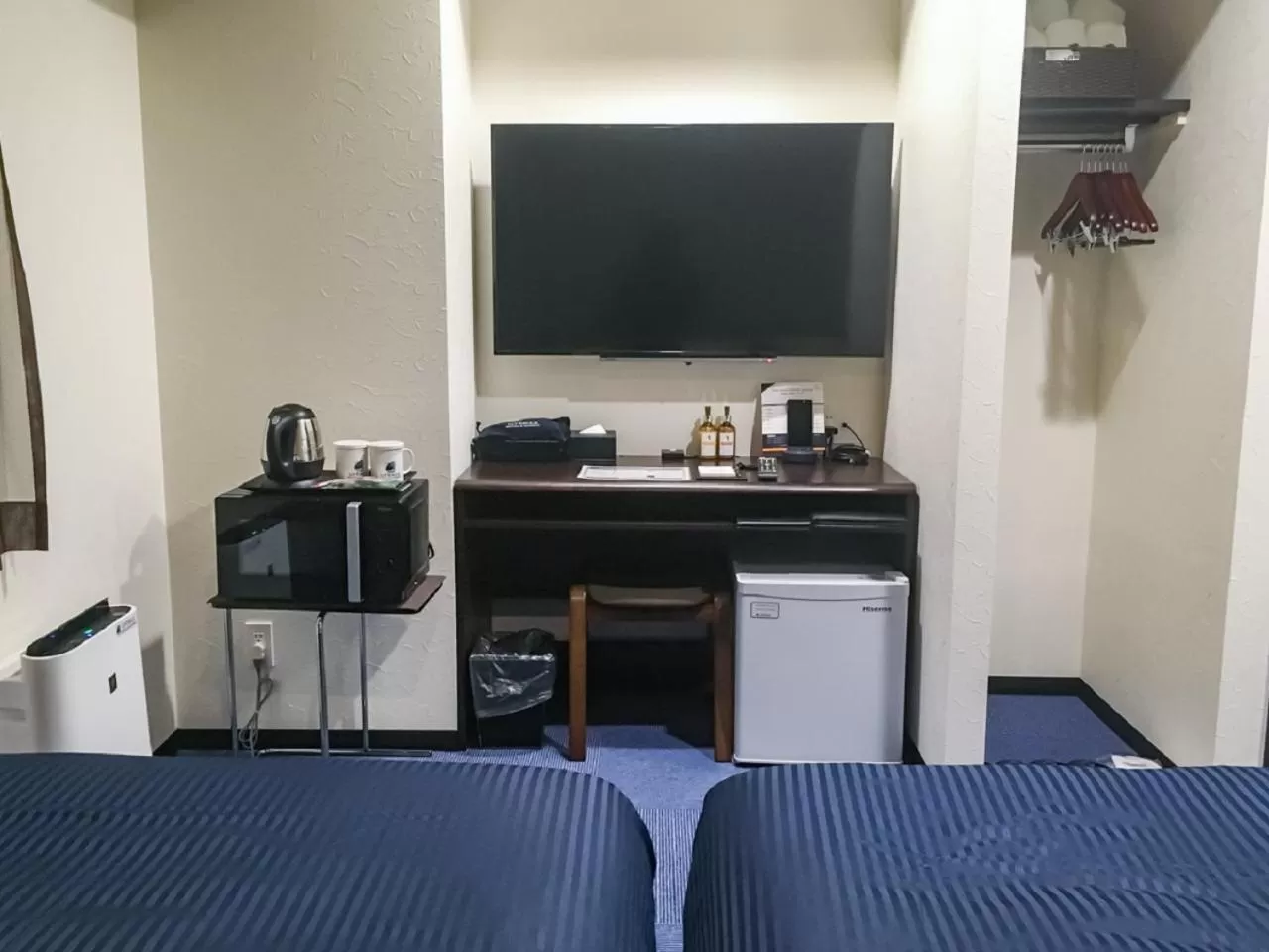 Bed in HOTEL LiVEMAX Yokkaichi Ekimae