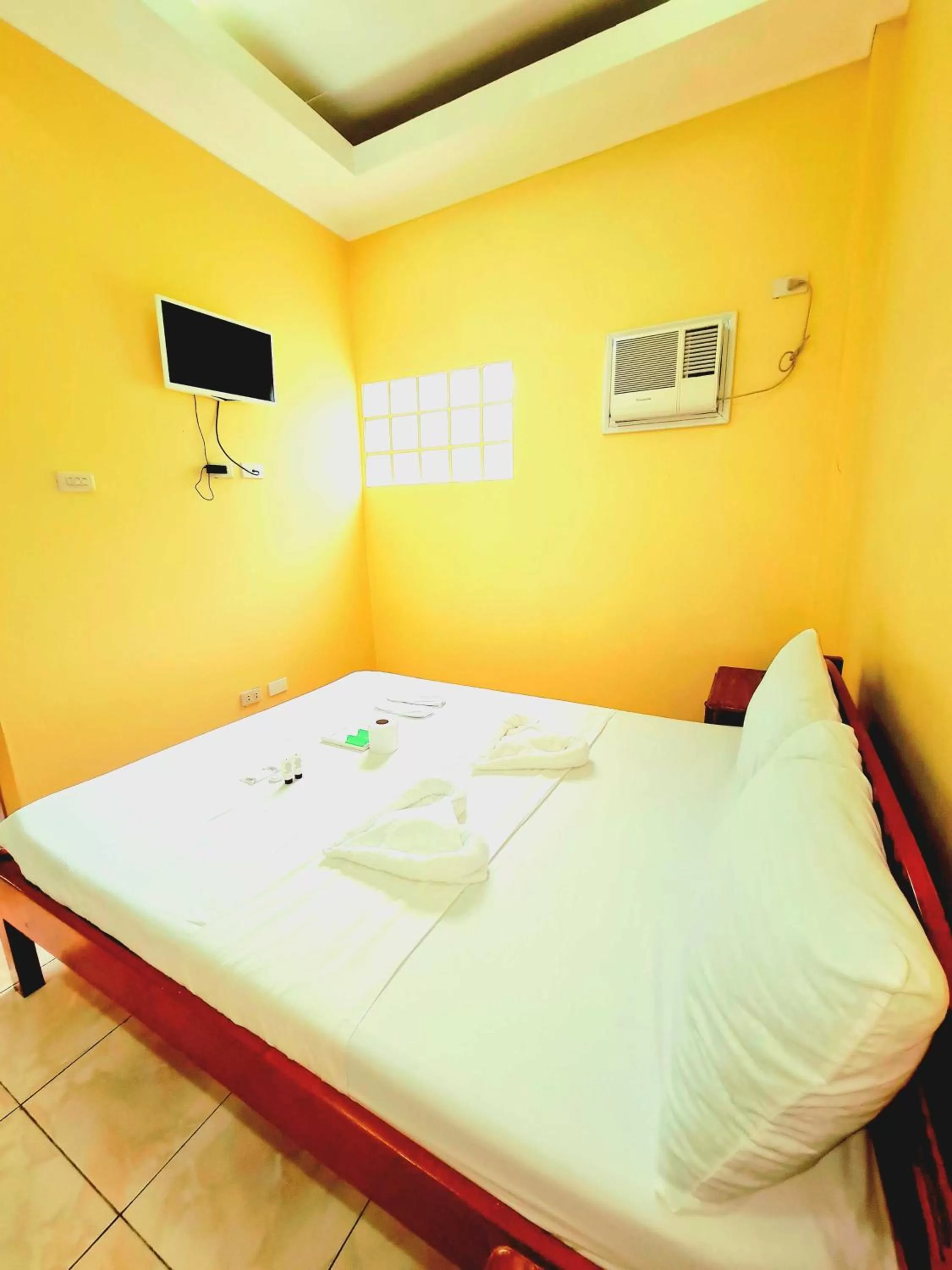 Bed in La-Familia Guest House