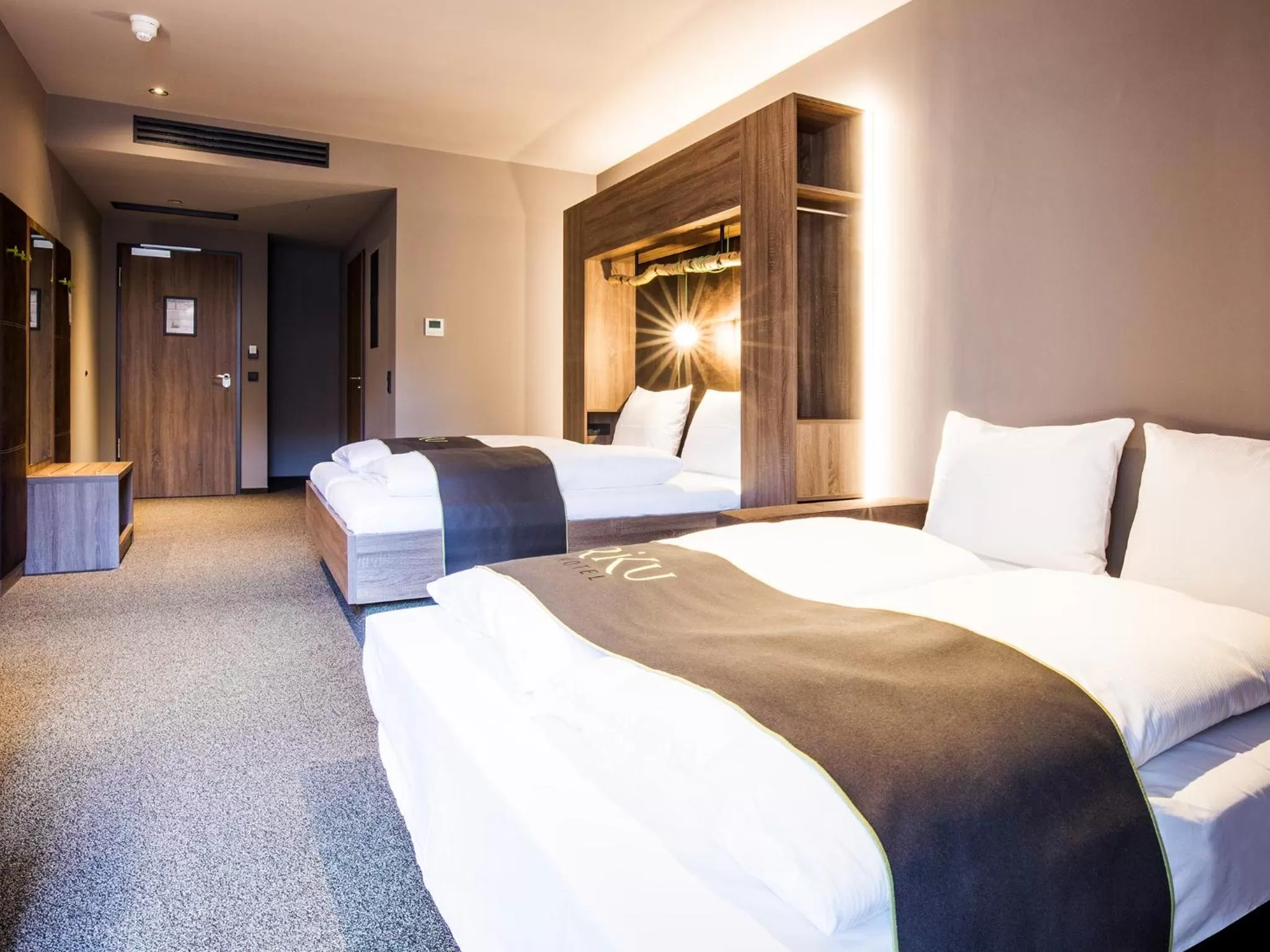 Photo of the whole room, Bed in RiKu HOTEL Ulm