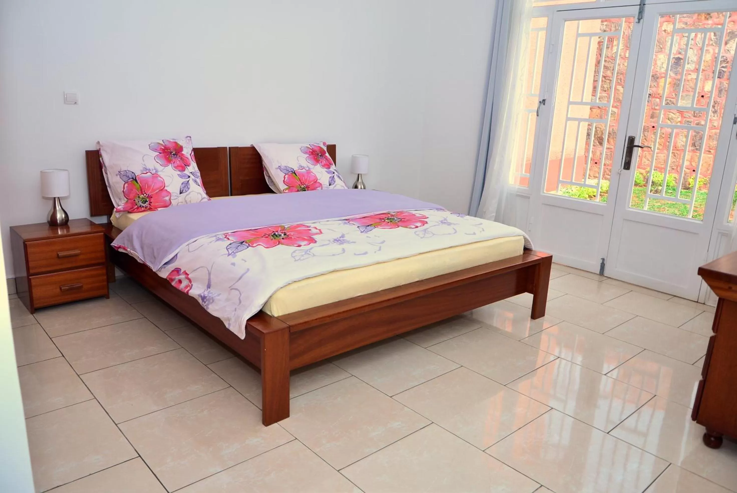 Bed in Hôtel Maisons-Sifa